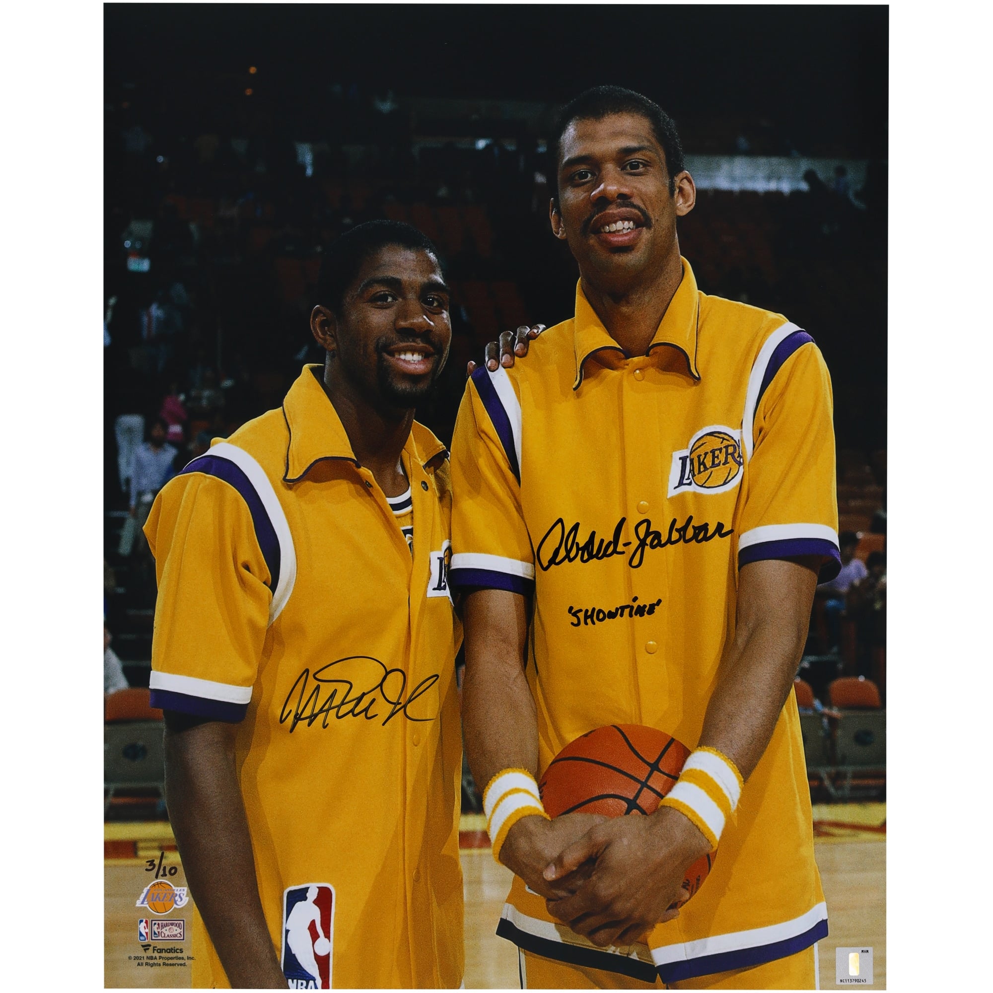 Magic Johnson & Kareem Abdul-Jabbar Los Angeles Lakers Autographed 16" x 20" Warm-ups Photograph with "Showtime" Inscription