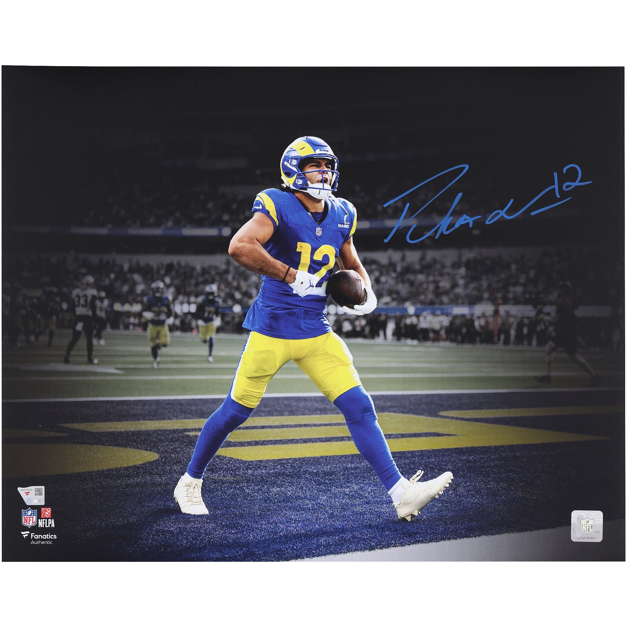 Photo dédicacée de Puka Nacua, joueur des Rams de Los Angeles, célébrant un touchdown (40 x 50 cm).