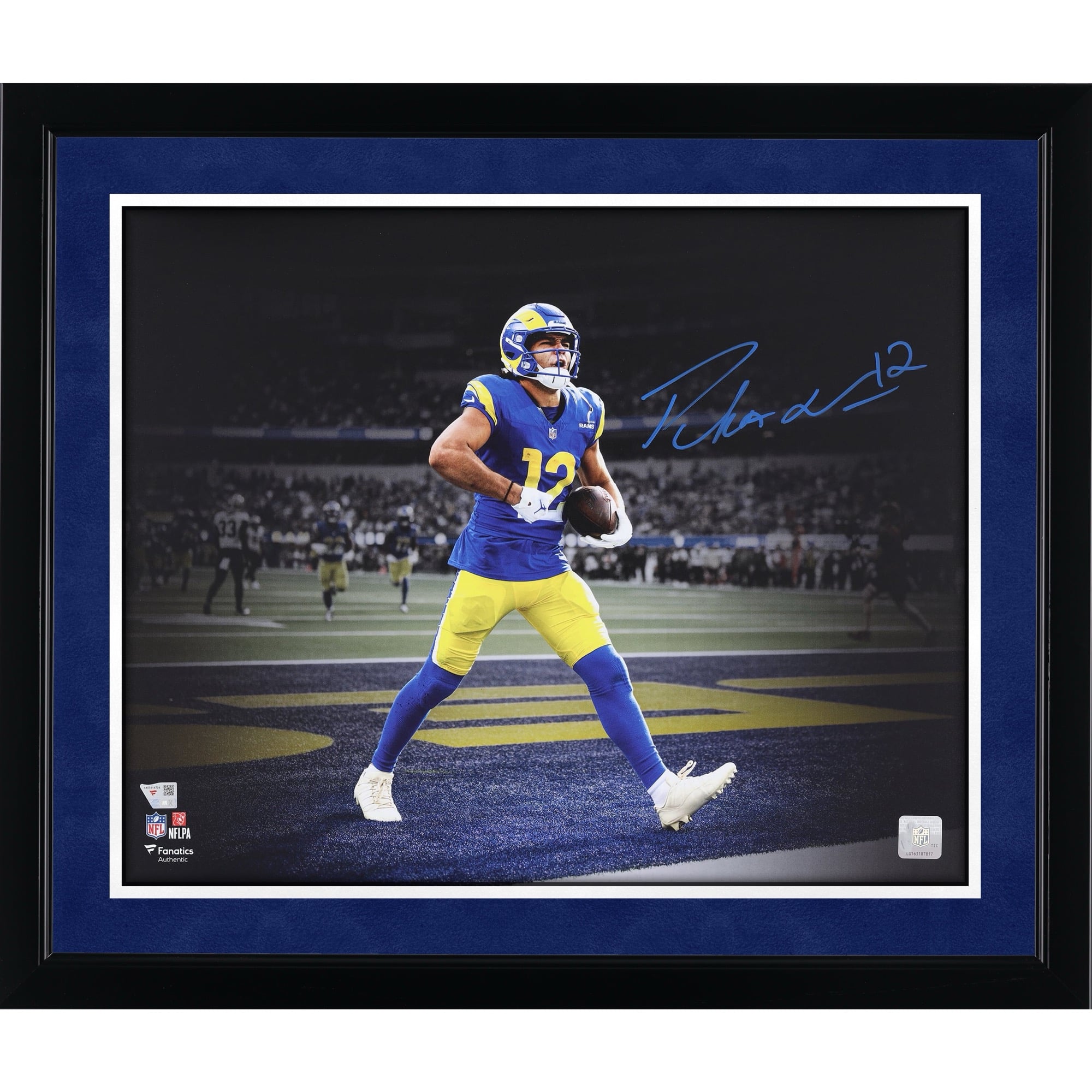 Photo dédicacée de Puka Nacua, joueur des Rams de Los Angeles, célébrant un touchdown (40 x 50 cm).