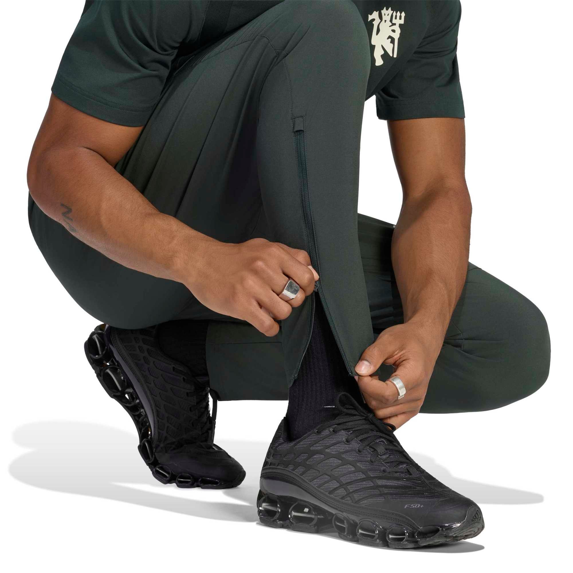 Men's adidas Green Manchester United 2026/27 Third Tiro Travel Tech Pants