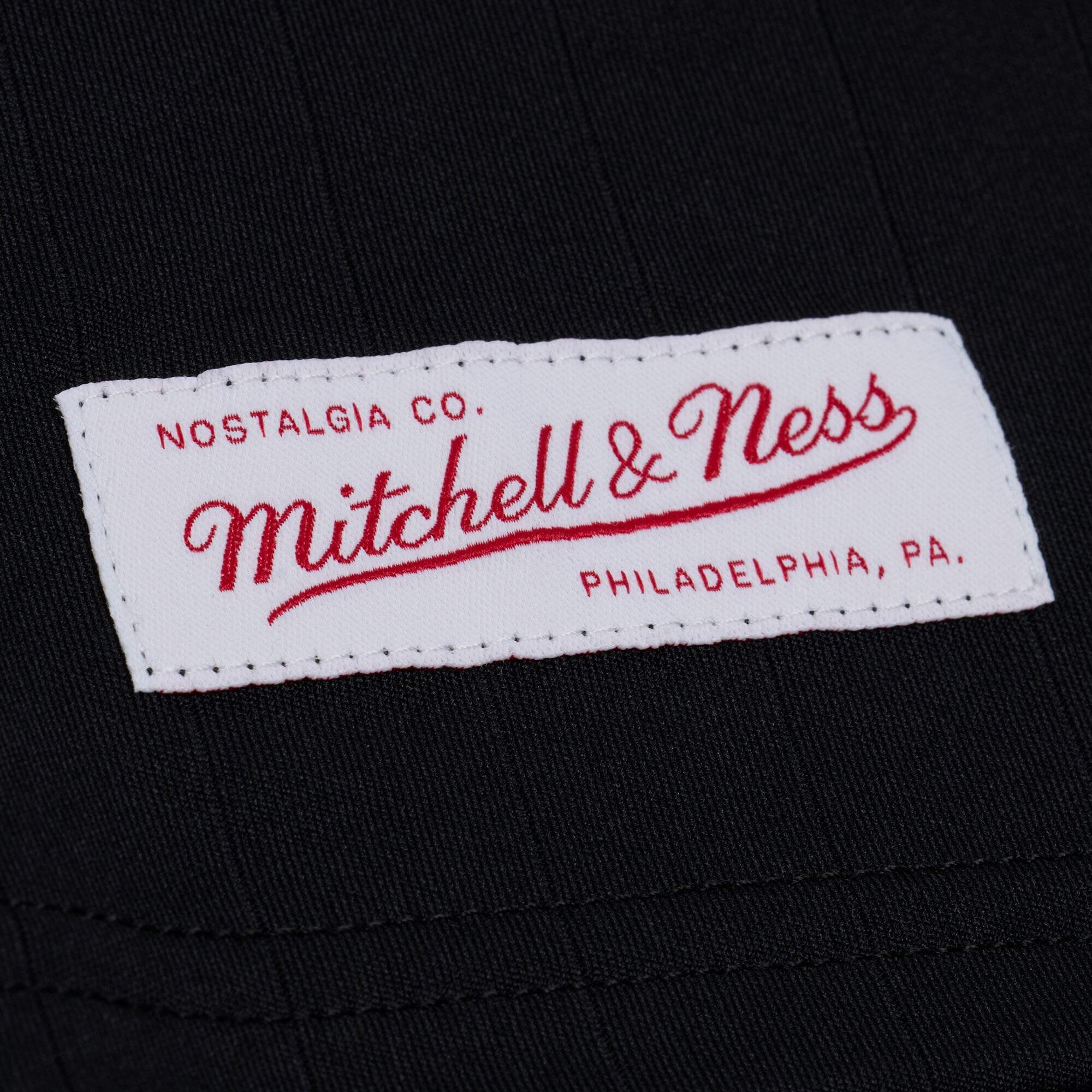 Men's Mitchell & Ness  Black Miami Heat Polo Jersey