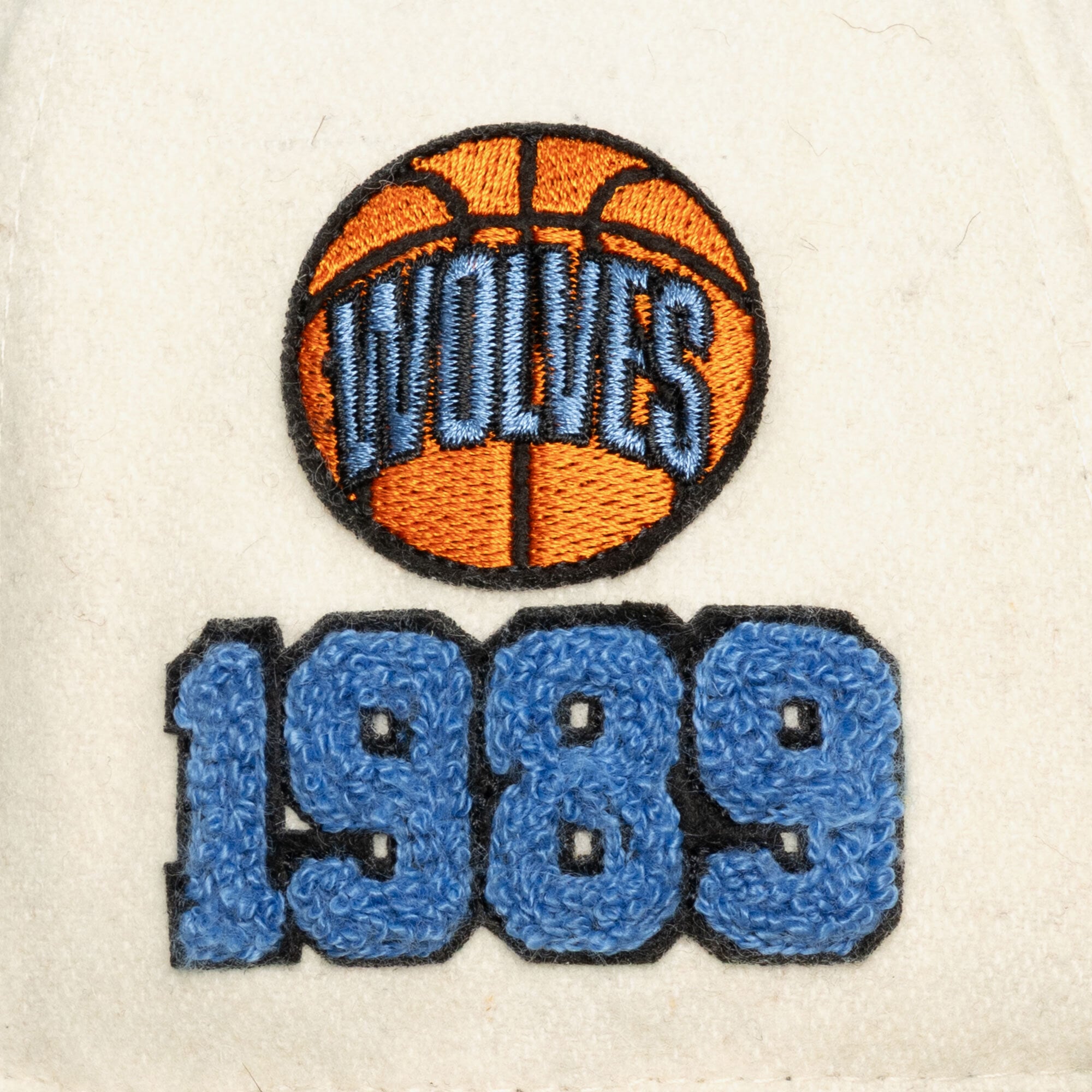 Casquette unisexe Mitchell & Ness crème Minnesota Timberwolves Team Pro ajustable