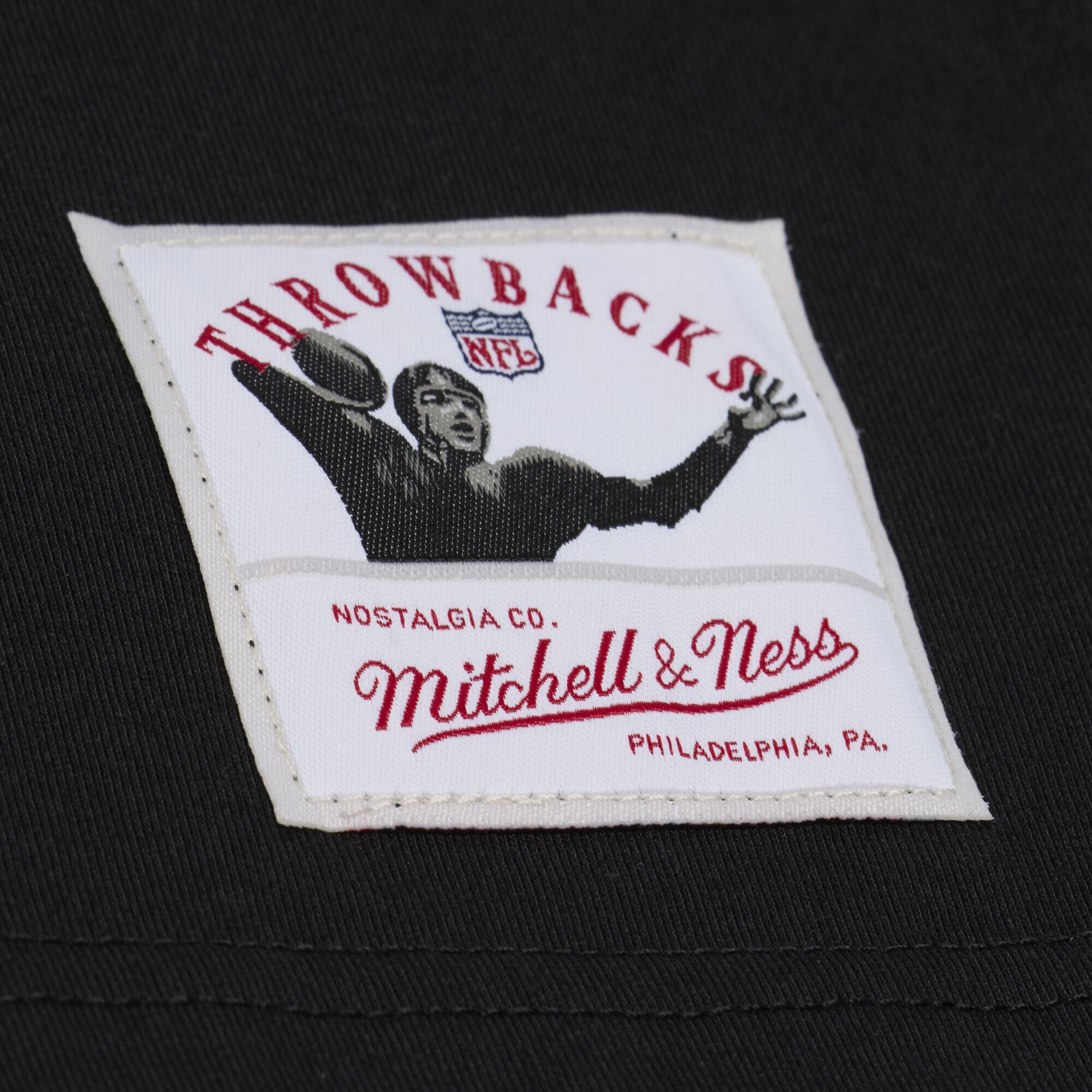 Men's Mitchell & Ness Randy Moss Black Minnesota Vikings Retired Solo Player T-Shirt