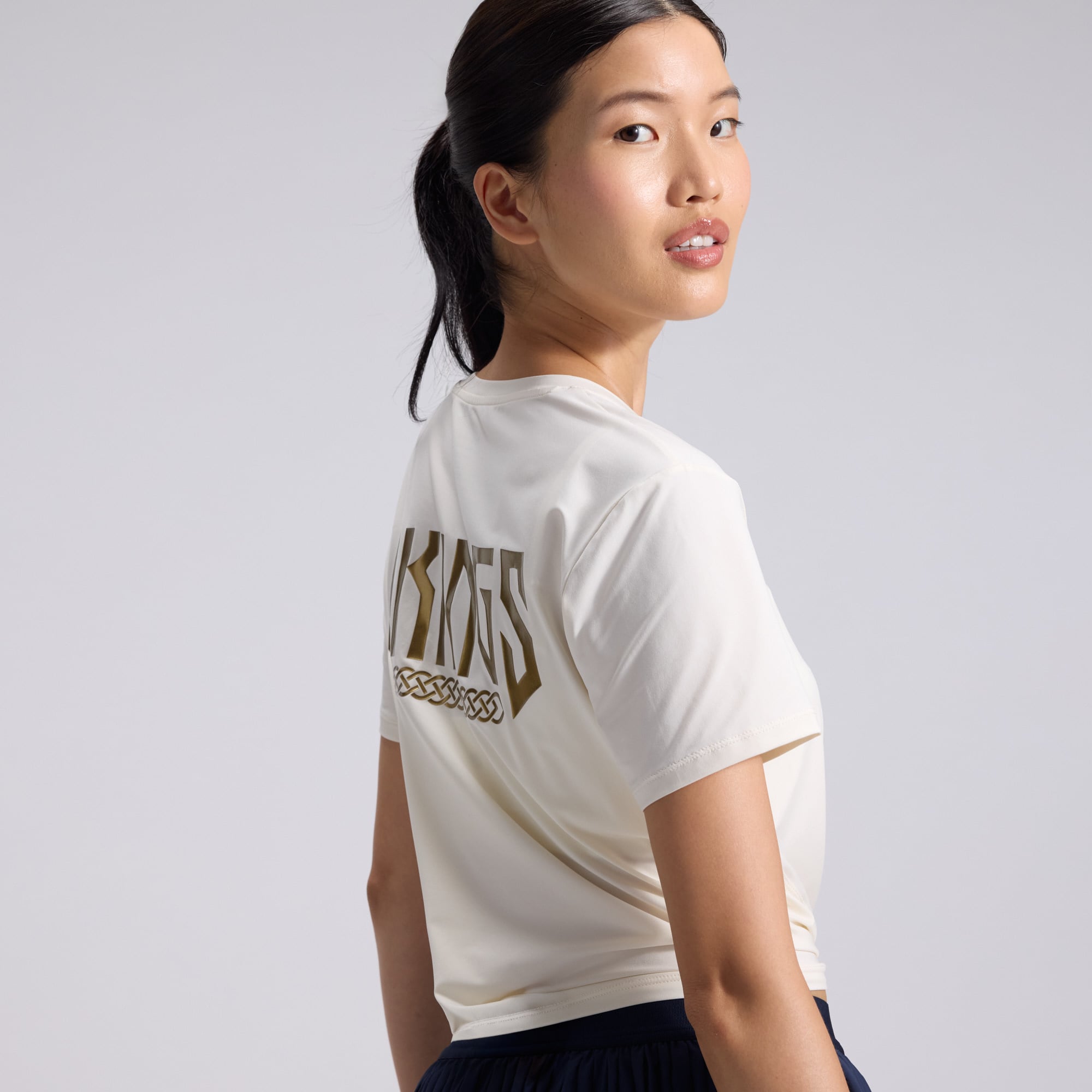 Women's Nike  Cream Minnesota Vikings 2026 Rivalries Collection Classic Twist Cropped T-Shirt