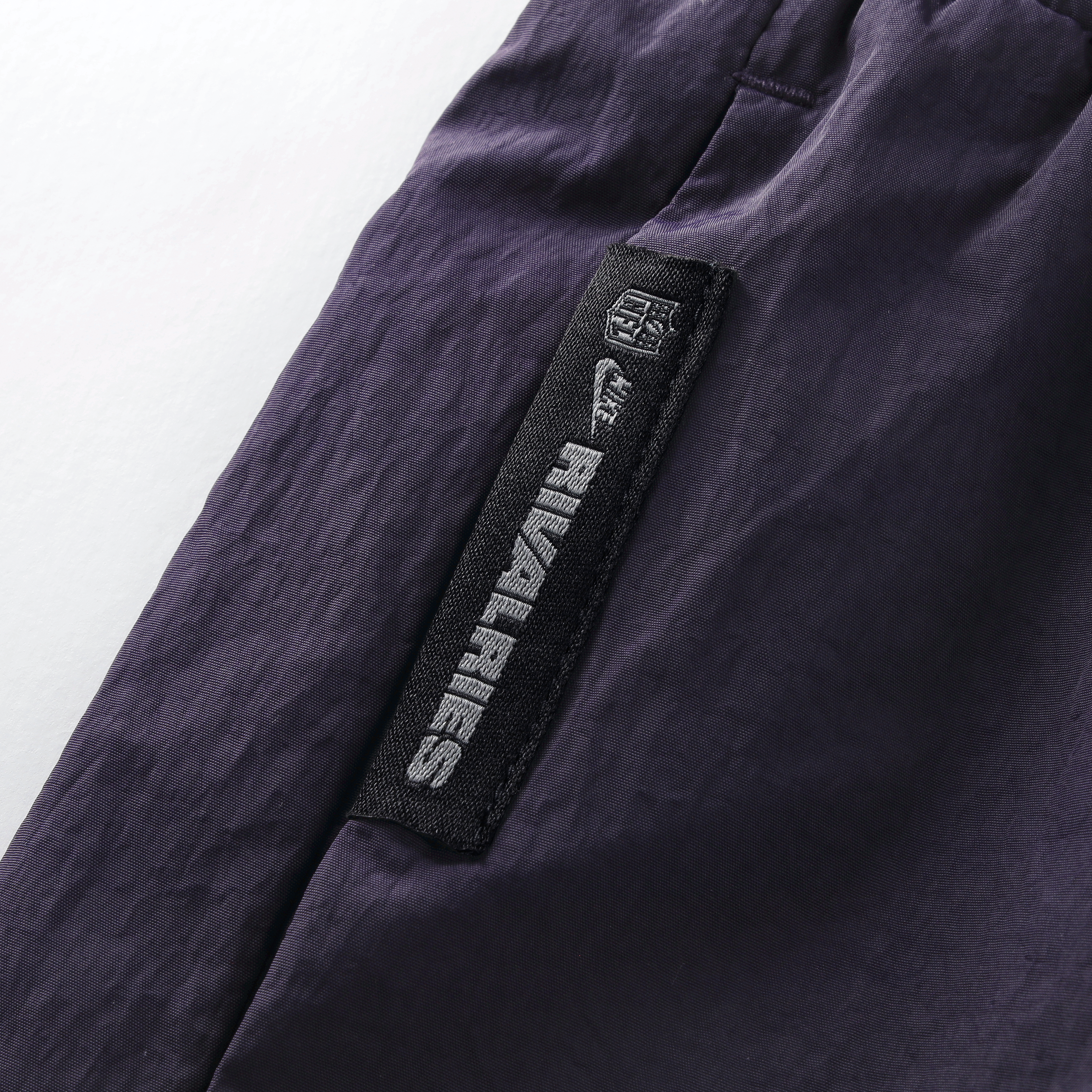 Pantalon tissé à jambes larges Nike pour femme, collection Minnesota Vikings 2026 Rivalries, violet