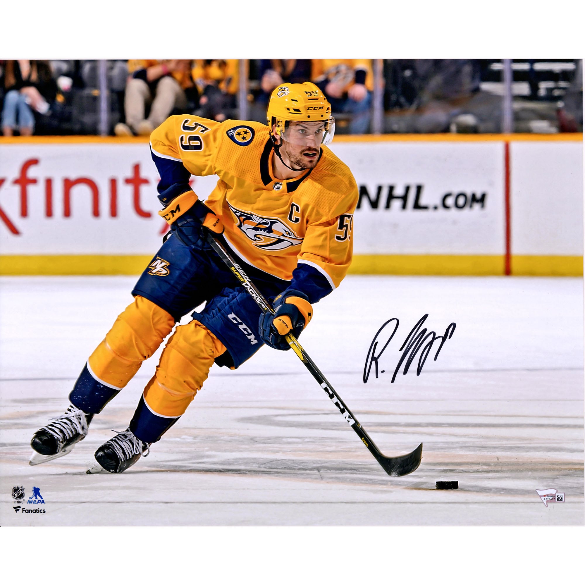 Photo de patinage autographiée de Roman Josi, des Predators de Nashville, en maillot doré (16 po x 20 po).