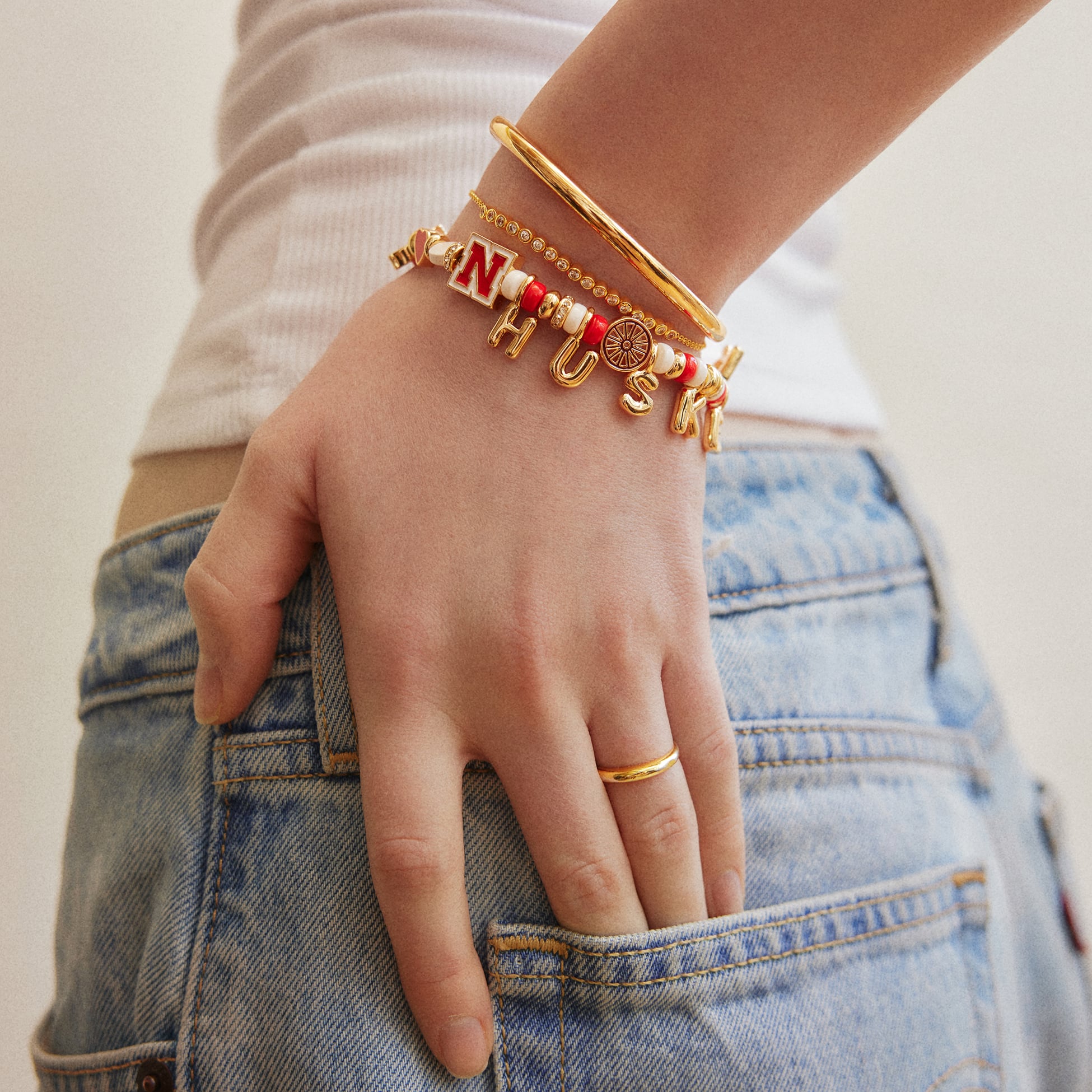 Bracelet BaubleBar à slogan et motif des Nebraska Huskers