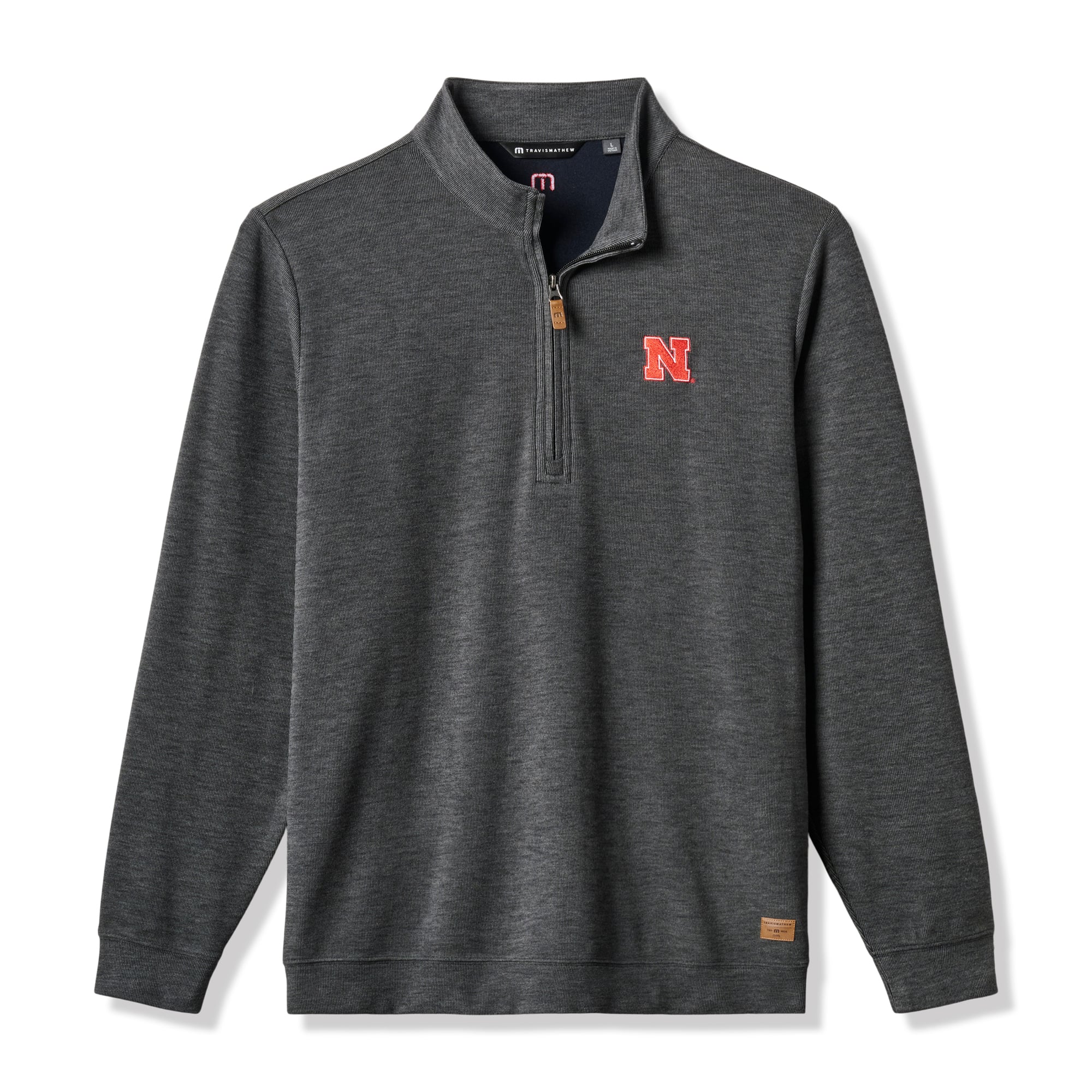 Pull TravisMathew Heather Black Nebraska Huskers Cloud Home Game pour homme, col zippé, en mélange de trois matières.