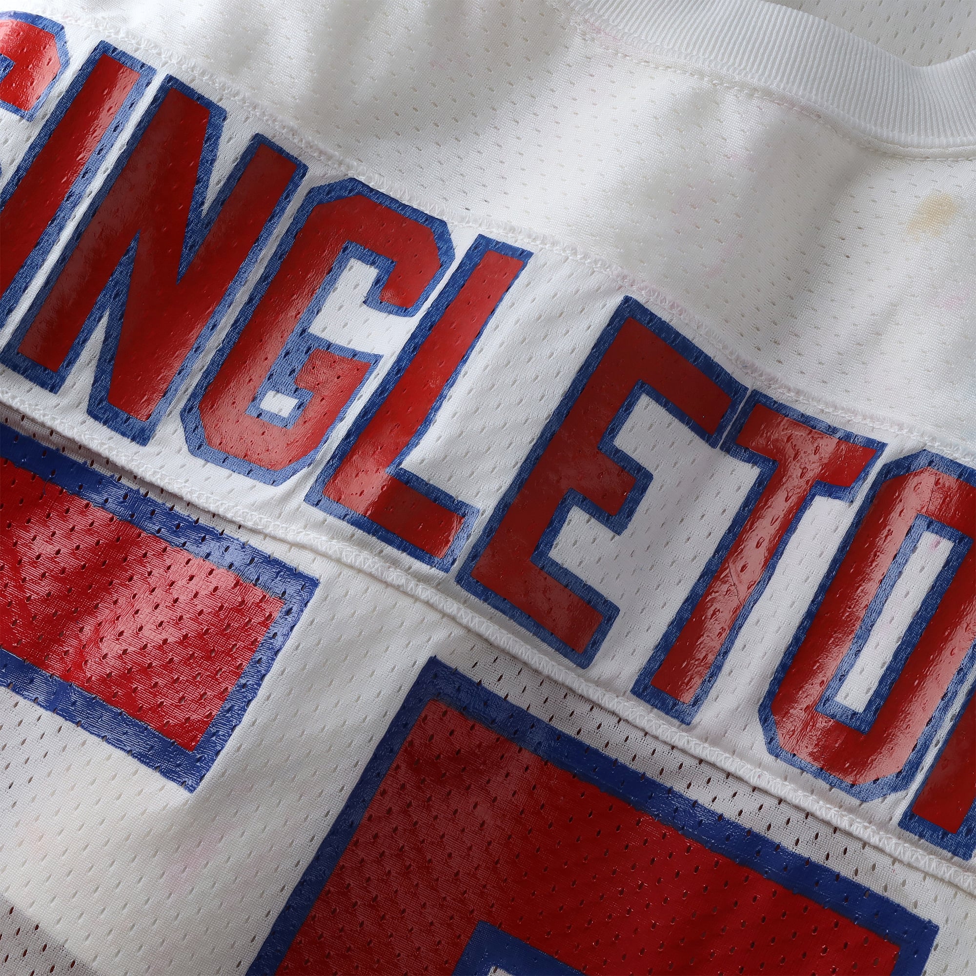 Maillot blanc n° 55 de Chris Singleton, joueur des New England Patriots, saison 1990 de la NFL