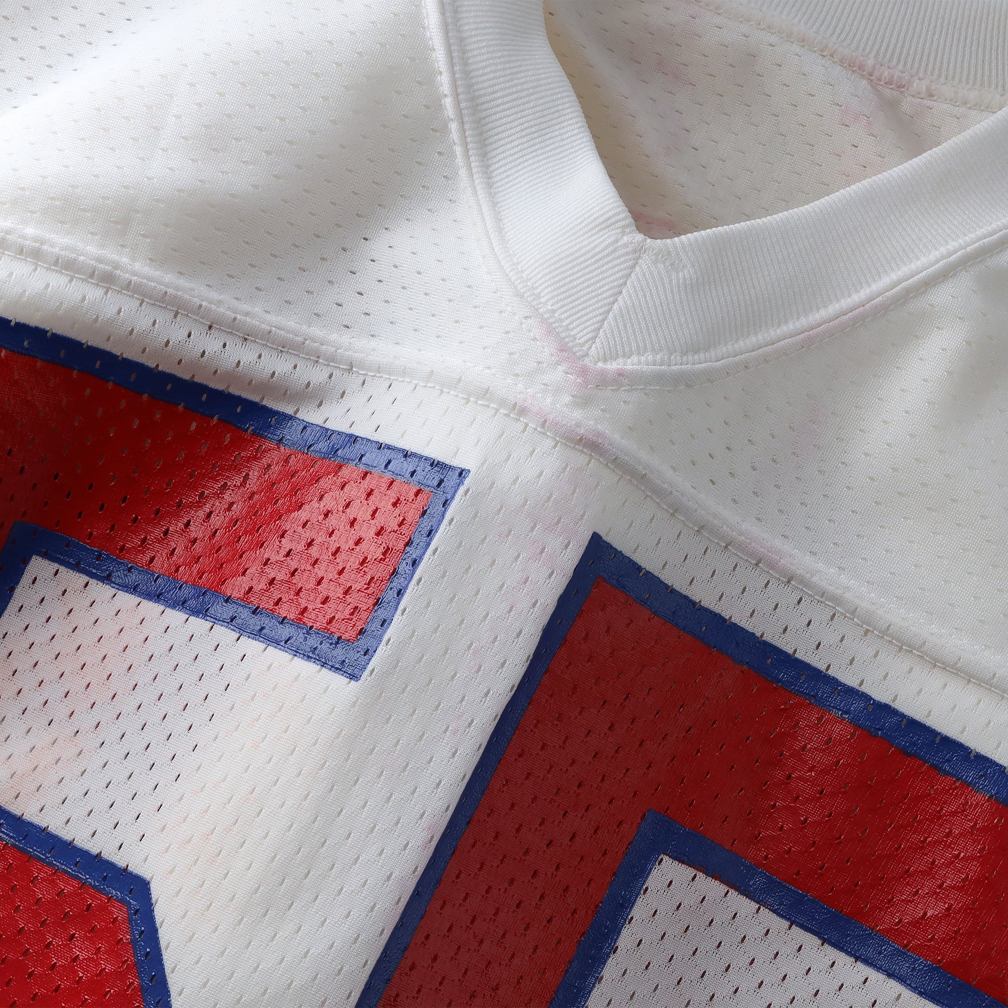 Maillot blanc n° 55 de Chris Singleton, joueur des New England Patriots, saison 1990 de la NFL