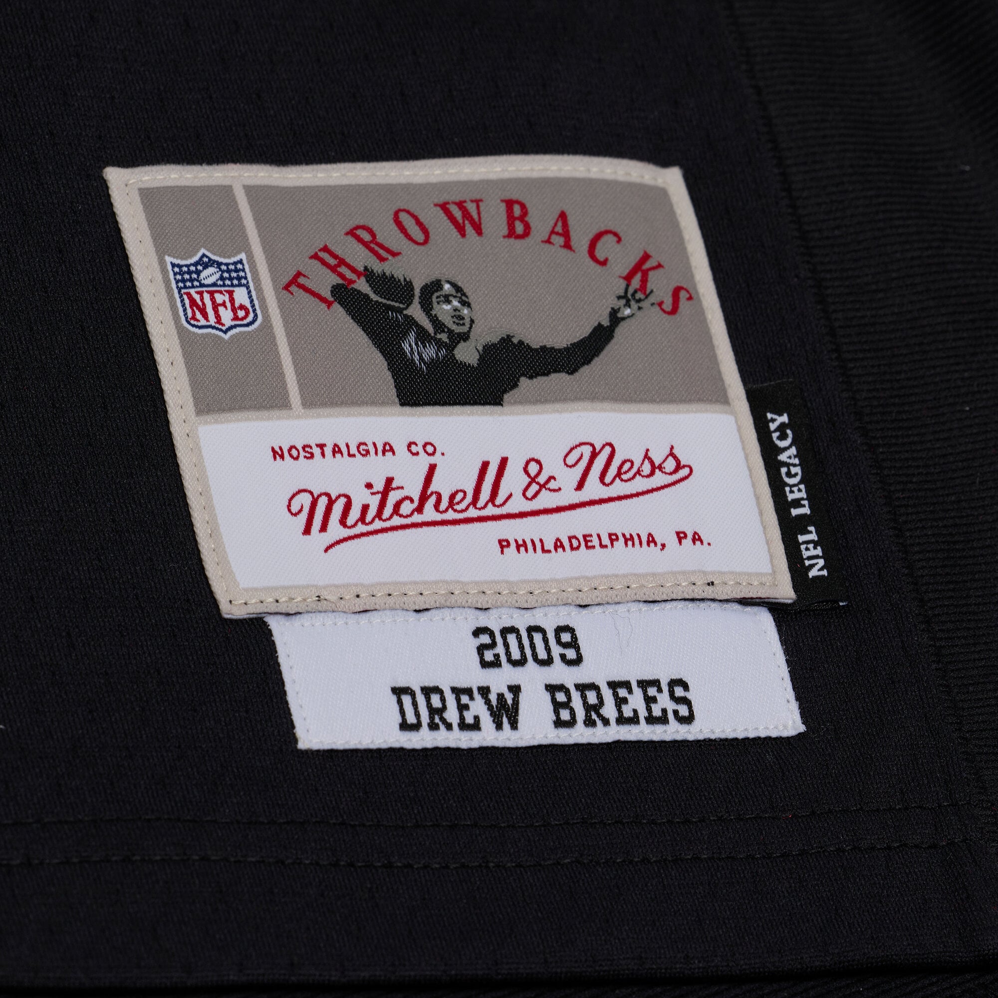 Maillot Mitchell & Ness Drew Brees noir New Orleans Saints 2009 Legacy pour homme