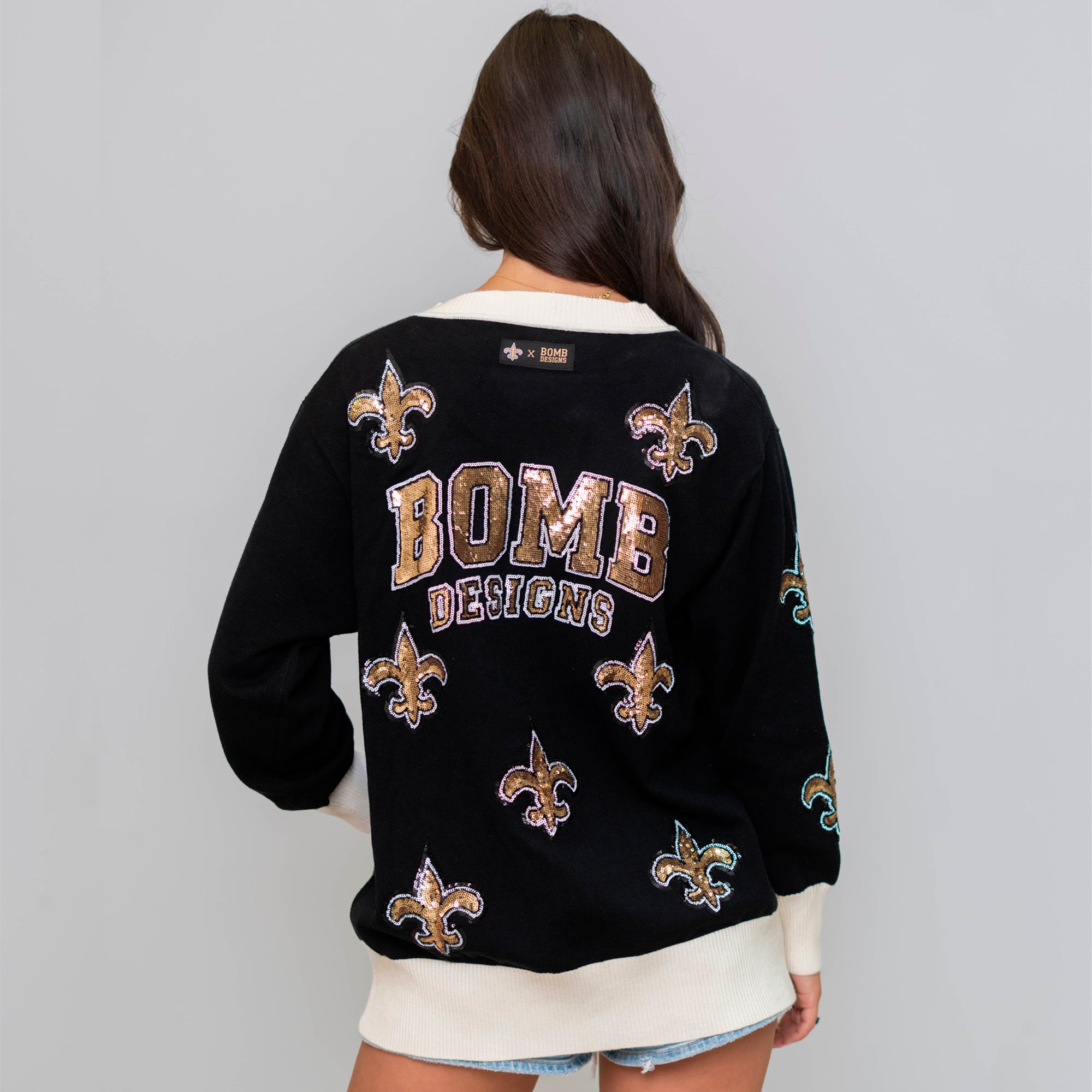 Gilet noir à logo dispersé des Saints de la Nouvelle-Orléans pour femme, marque Bomb Designs