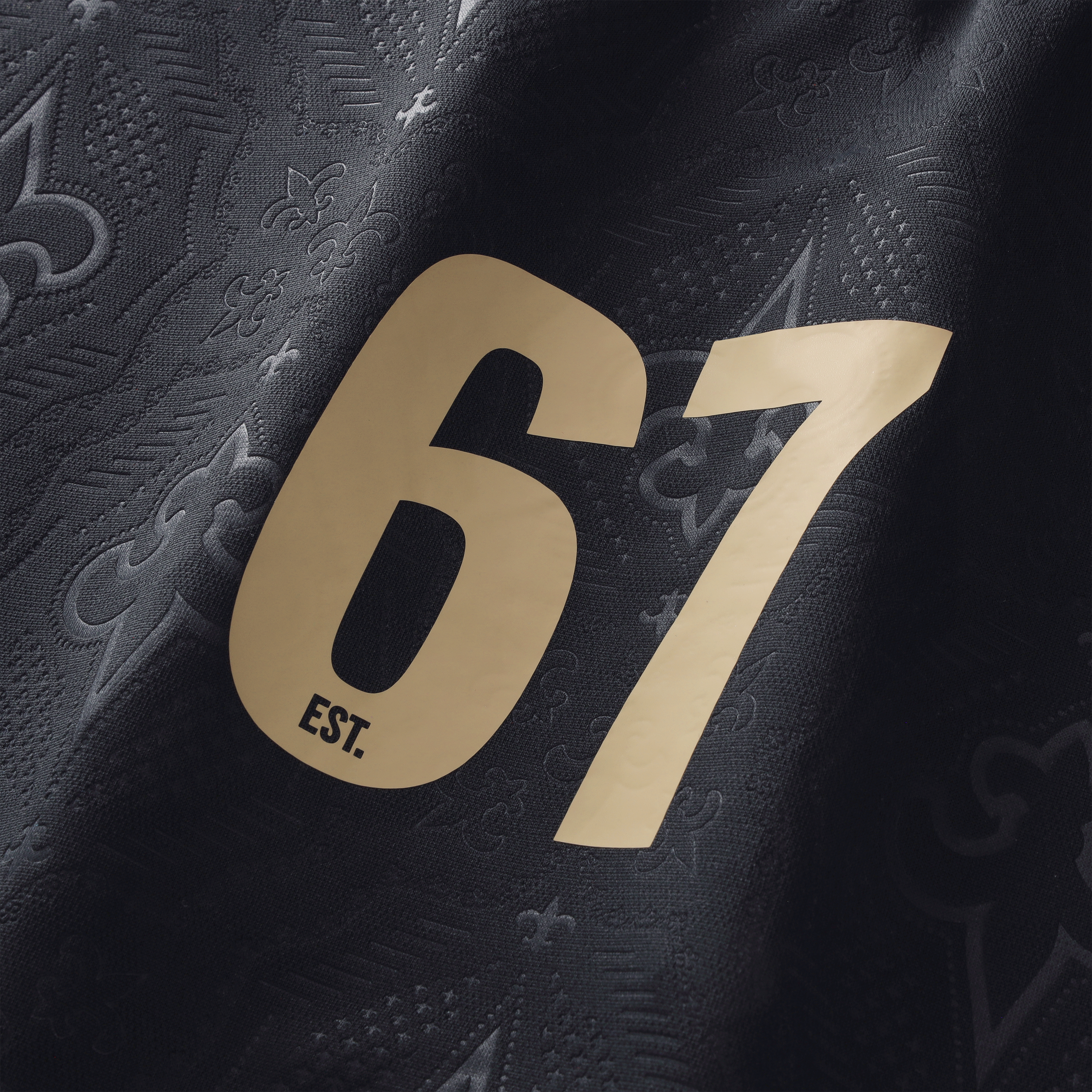 T-shirt de supporter Youth Fanatics noir New Orleans Saints à col en football.