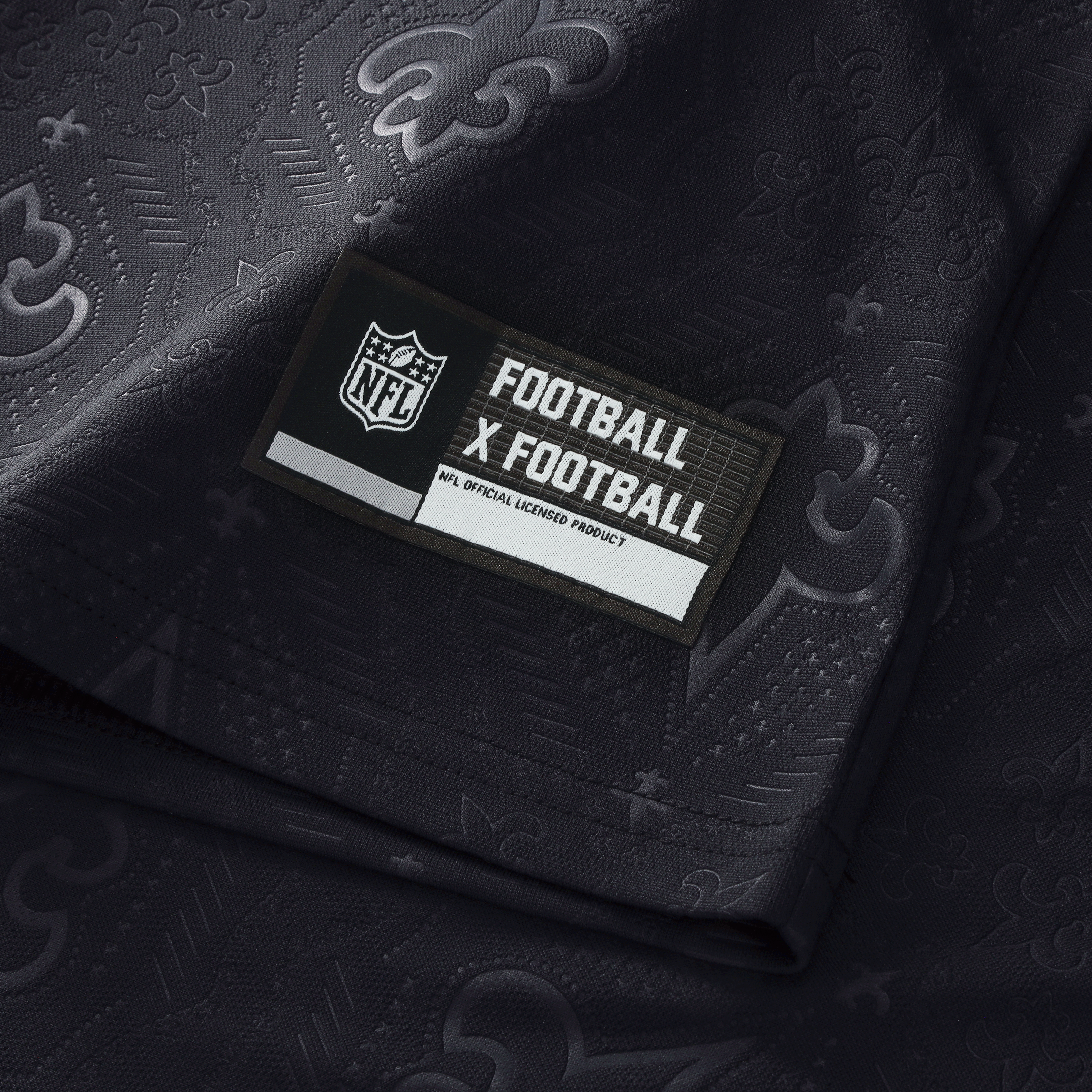 T-shirt de supporter Youth Fanatics noir New Orleans Saints à col en football.