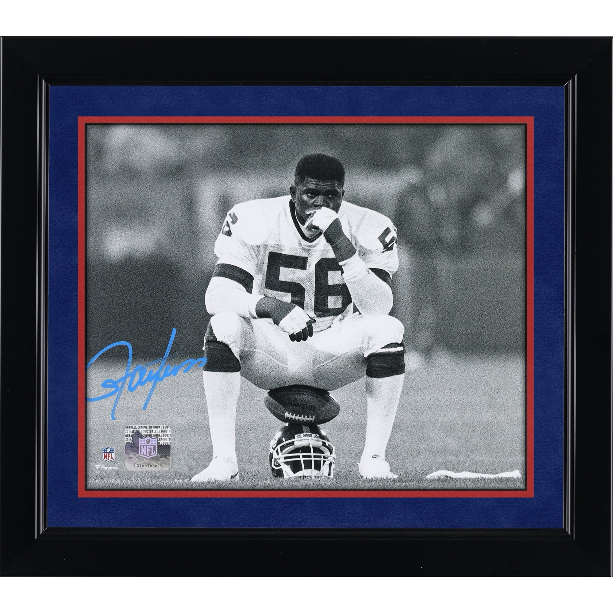 Lawrence Taylor New York Giants Autographed 8" x 10" Sitting on Helmet Photograph