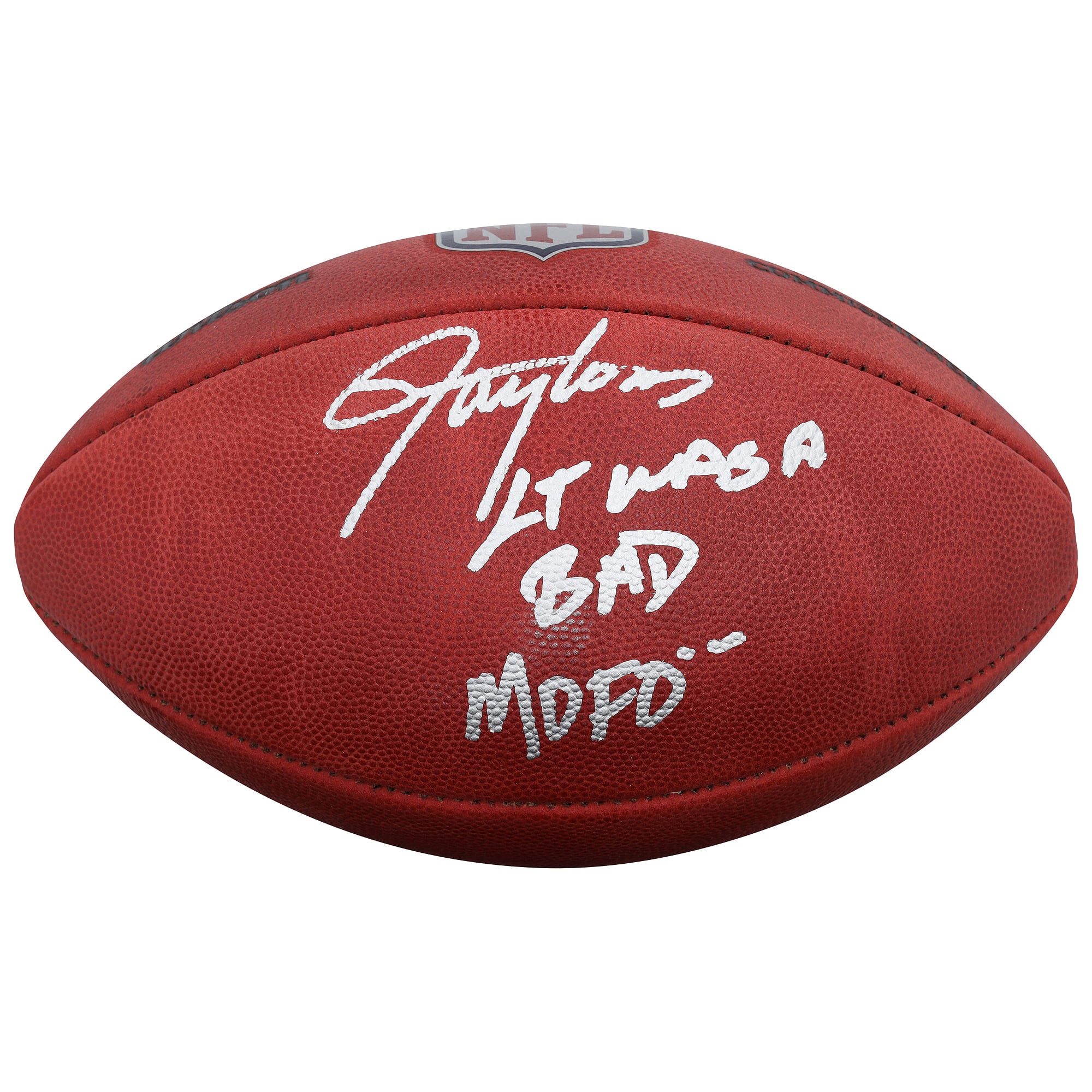 Ballon de football américain Duke en couleurs, autographié par Lawrence Taylor (New York Giants), avec l'inscription « LT était un sacré dur à cuire ».