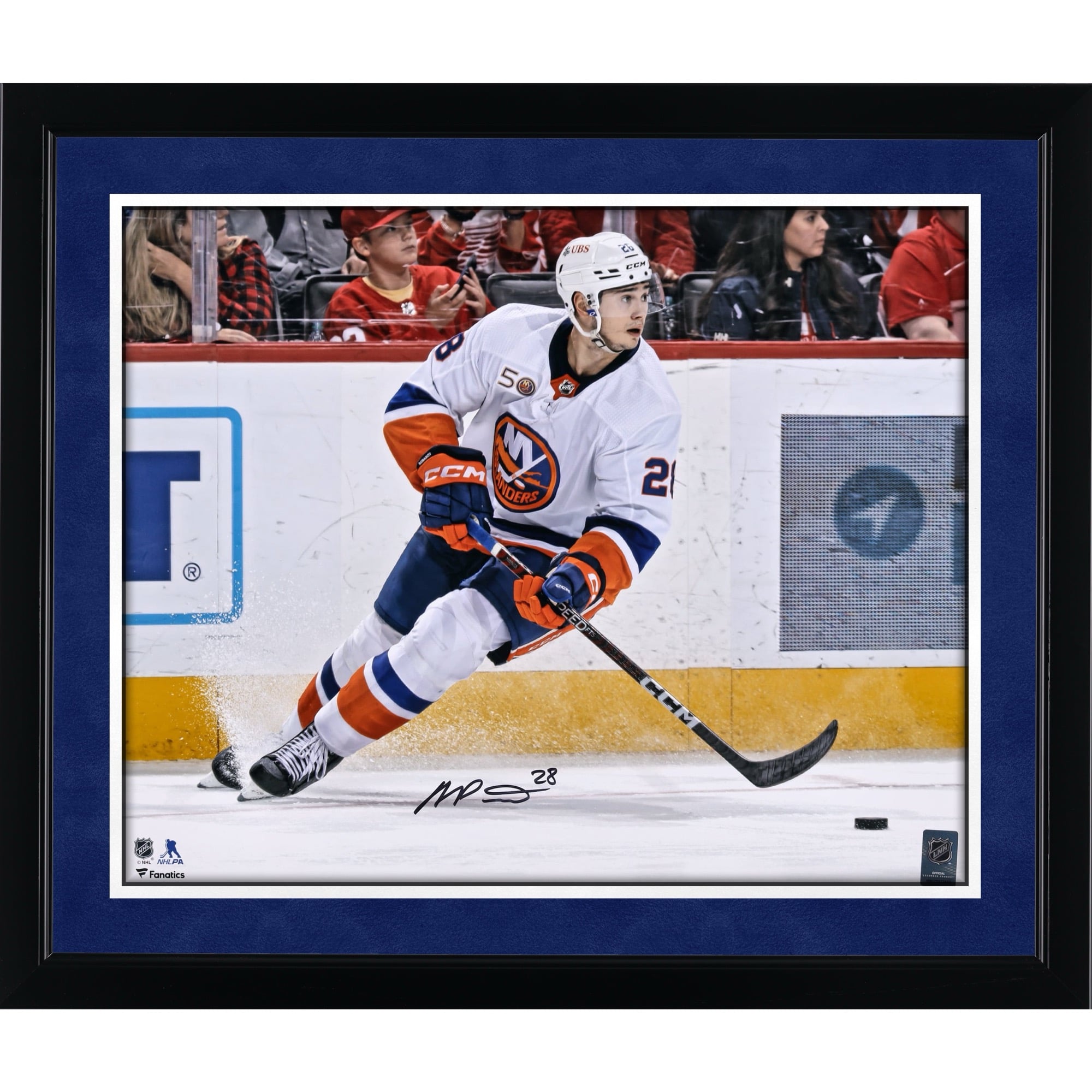 New York Islanders Alexander Romanov Autographed 16" x 20" White Jersey with Puck Photograph