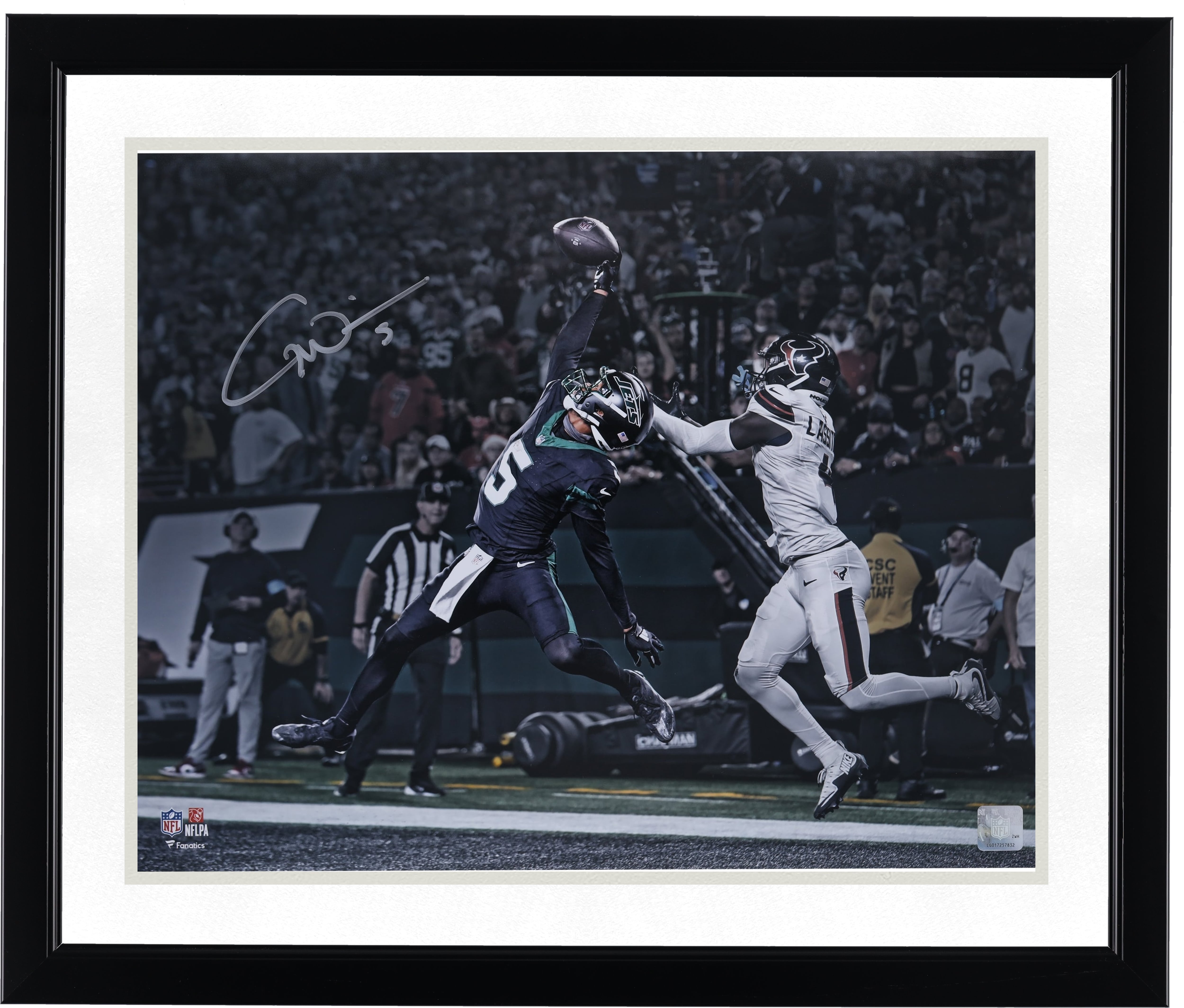 Garrett Wilson New York Jets Autographed 16" x 20" Leaping Touchdown Catch Photograph