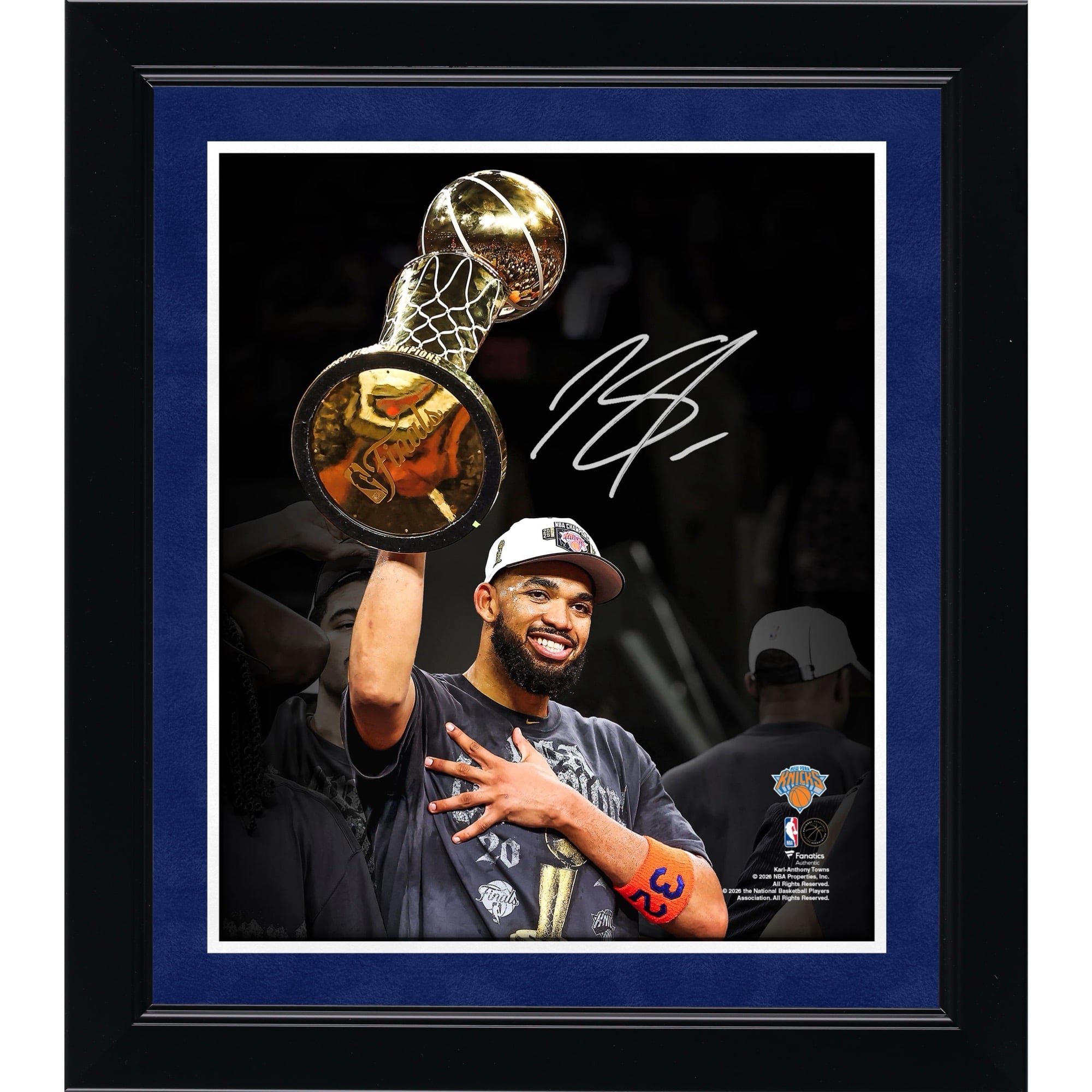 Karl-Anthony Towns New York Knicks Autographed 2026 NBA Finals Champions 8" x 10" Holding Larry O'Brien Trophy Spotlight Photograph