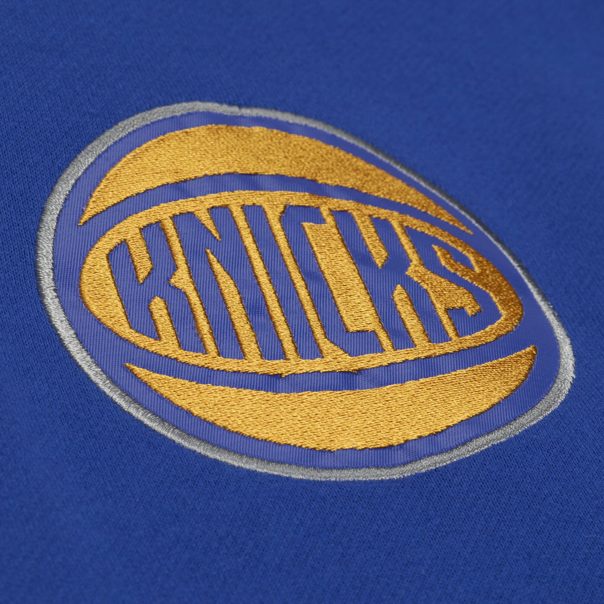 Sweat à capuche en polaire Mitchell & Ness bleu New York Knicks pour homme