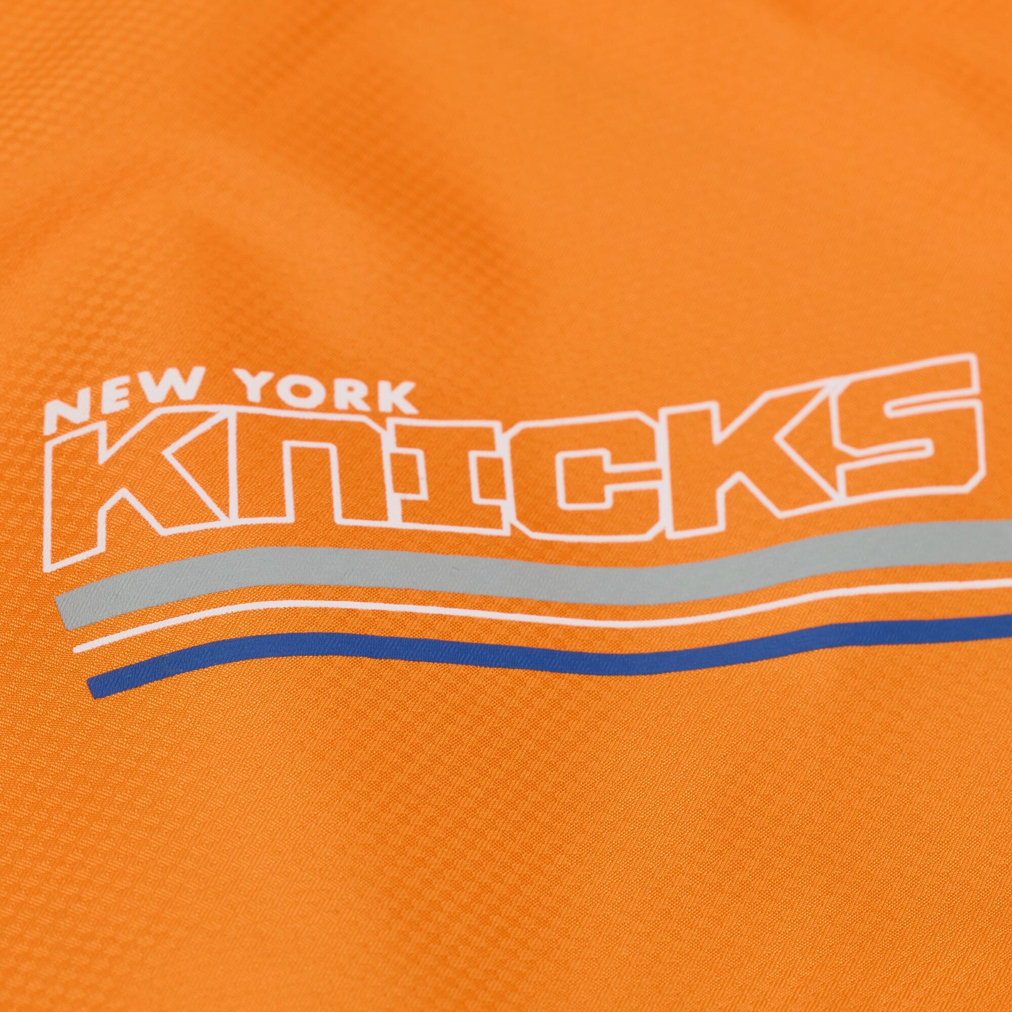 Veste coupe-vent demi-zip Mitchell & Ness bleue à carreaux triple motif New York Knicks pour homme
