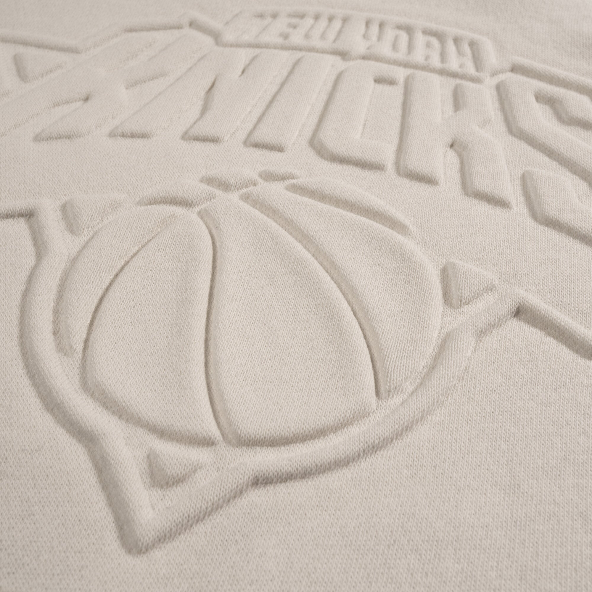 Unisex Stadium Essentials Cream New York Knicks Debossed Monochrome Logo Sweatshirt