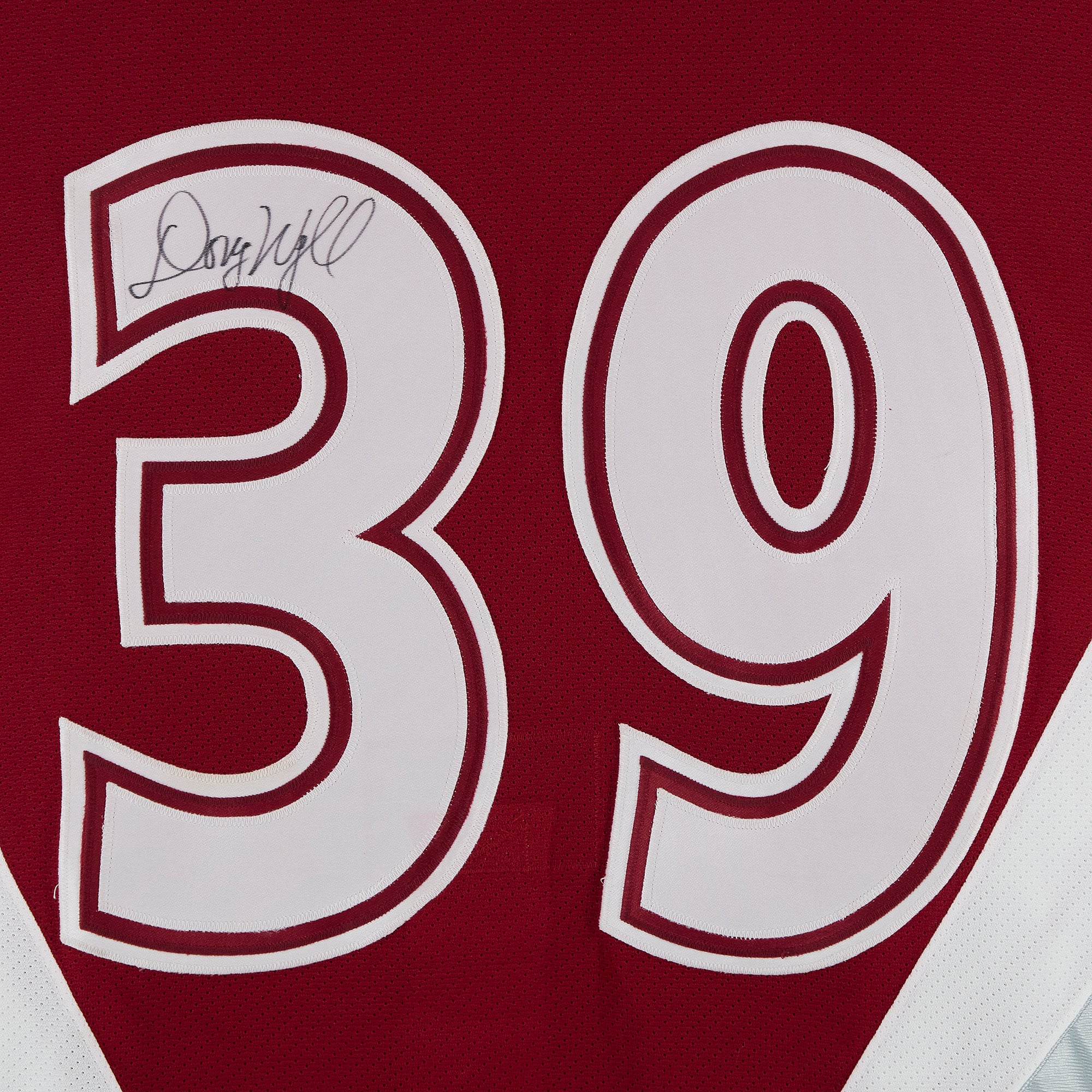 Maillot rouge n° 39 autographié par Doug Weight, porté lors du match des étoiles de la LNH de 1998, avec l'équipe Amérique du Nord.