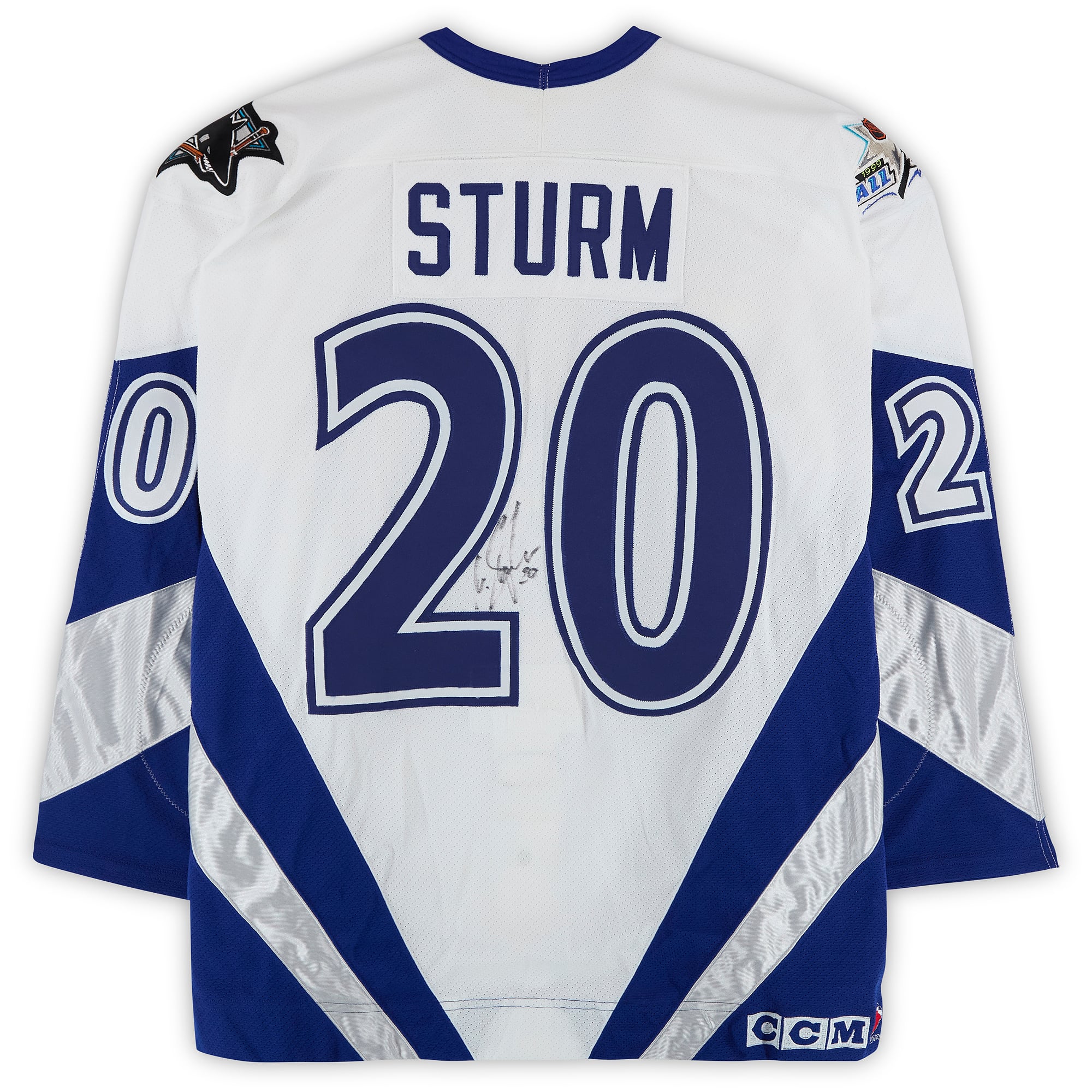 Maillot blanc n° 20 autographié par Marco Sturm, porté lors du match des étoiles de la LNH de 1999.