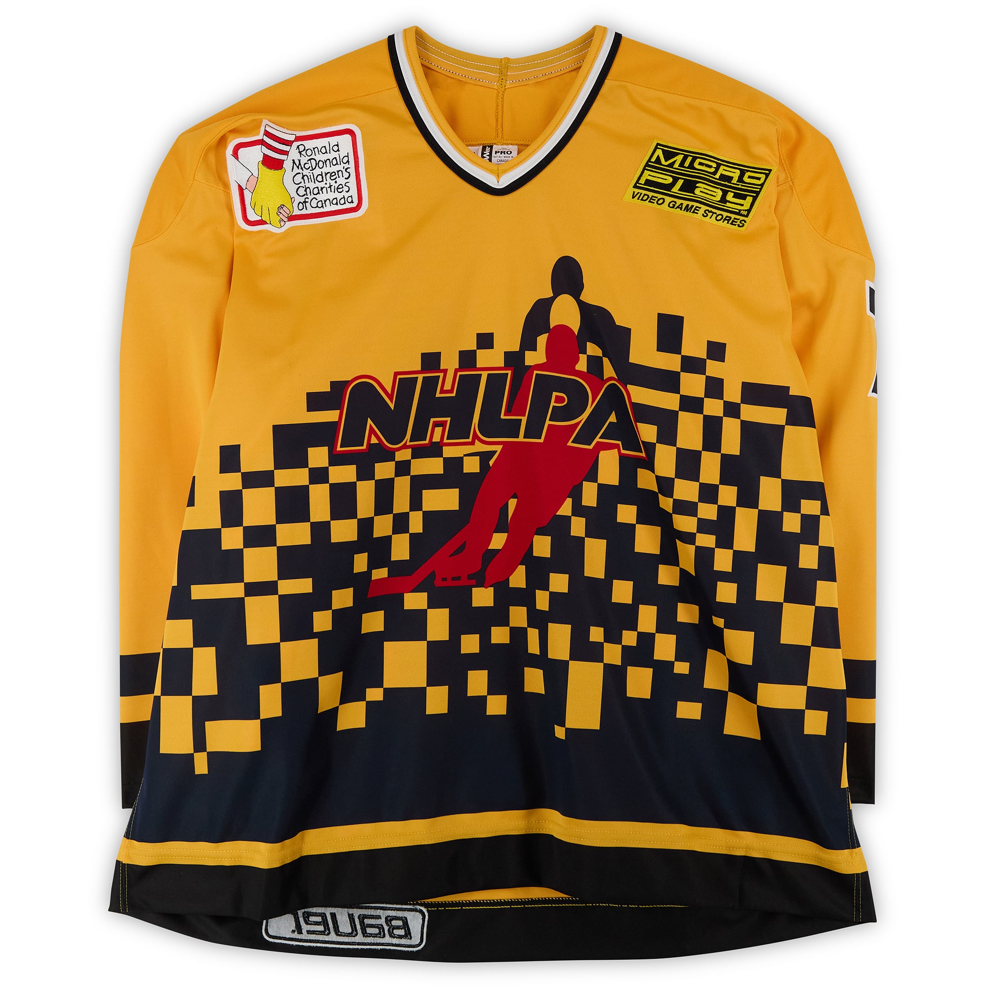 Maillot jaune numéro 7 porté par Mark Recchi, de l'équipe du Canada, lors du défi à 4 contre 4 de la LNH de 1994.
