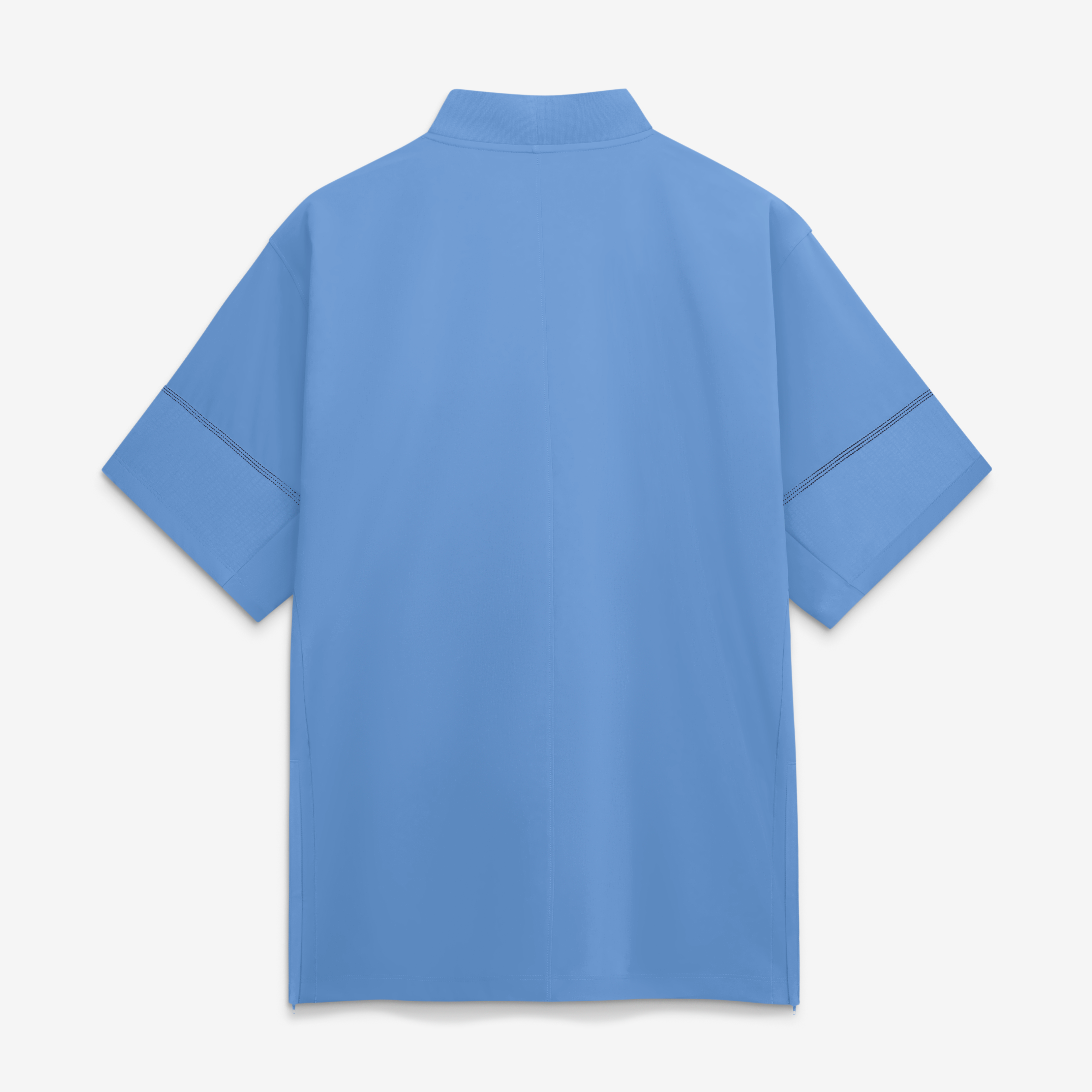 Veste d'entraîneur Jordan Brand bleu clair pour homme, North Carolina Tar Heels 2026 Sideline, manches courtes et fermeture éclair au quart, modèle Sideline 2026.