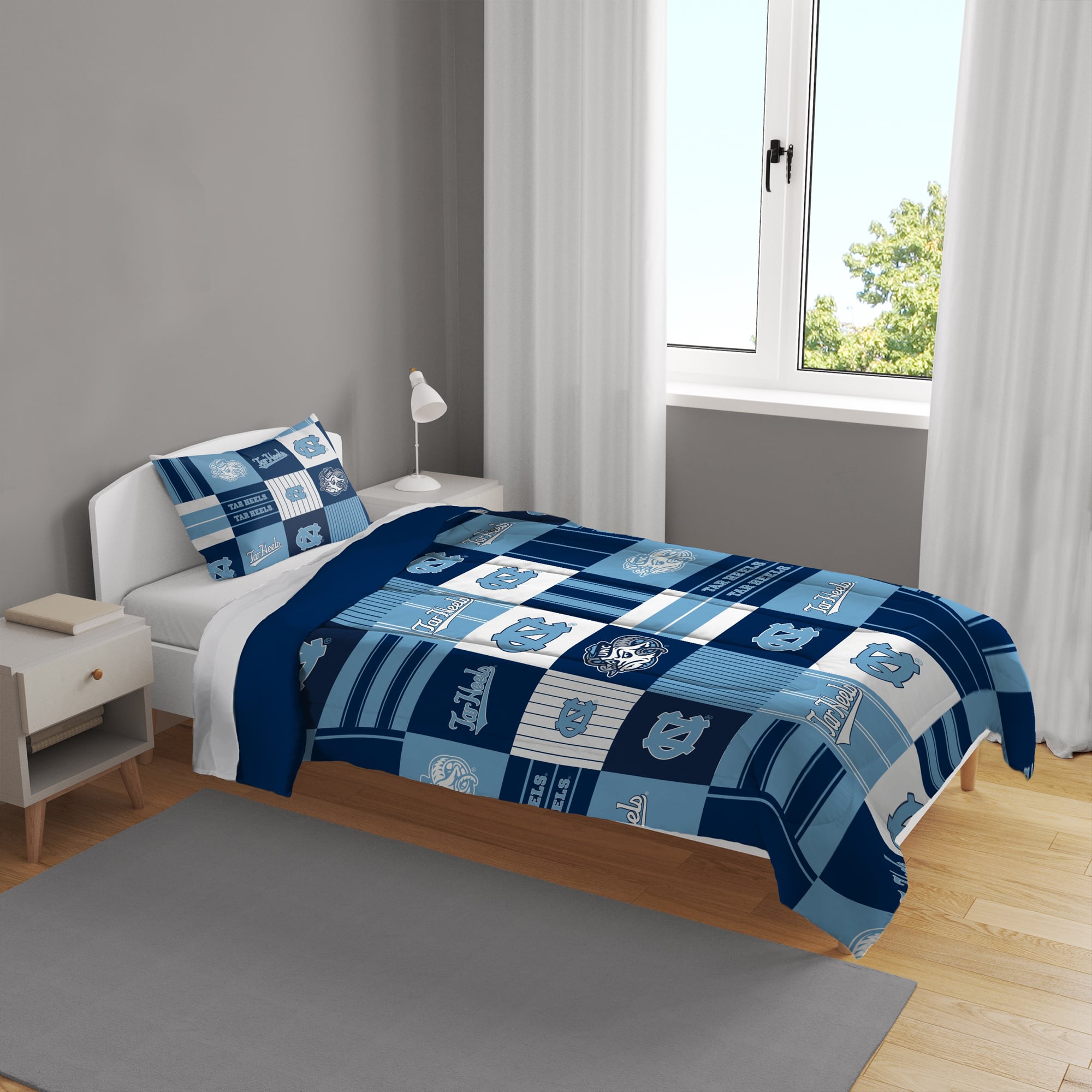 Ensemble de literie deux pièces Pegasus North Carolina Tar Heels à carreaux patchwork, pour lit simple/simple XL.