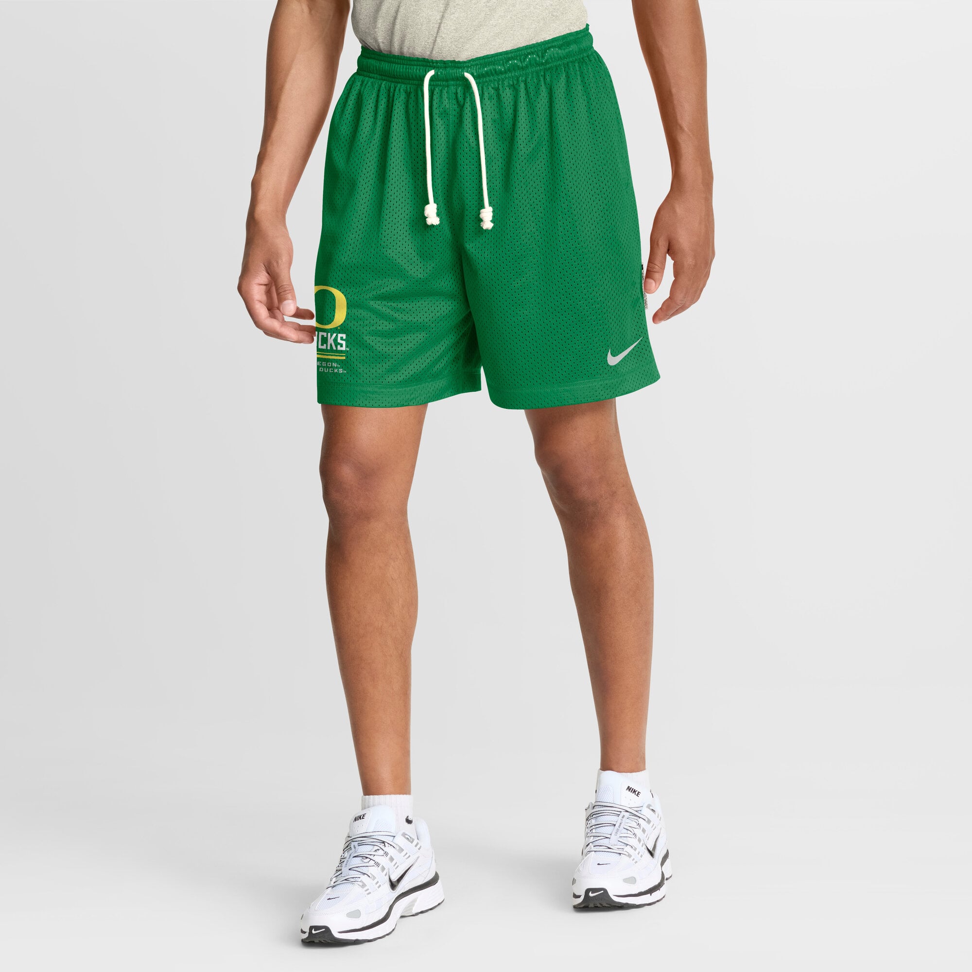 Short réversible Dri-FIT Nike vert/anthracite Oregon Ducks 2026 Sideline Standard Issue pour homme