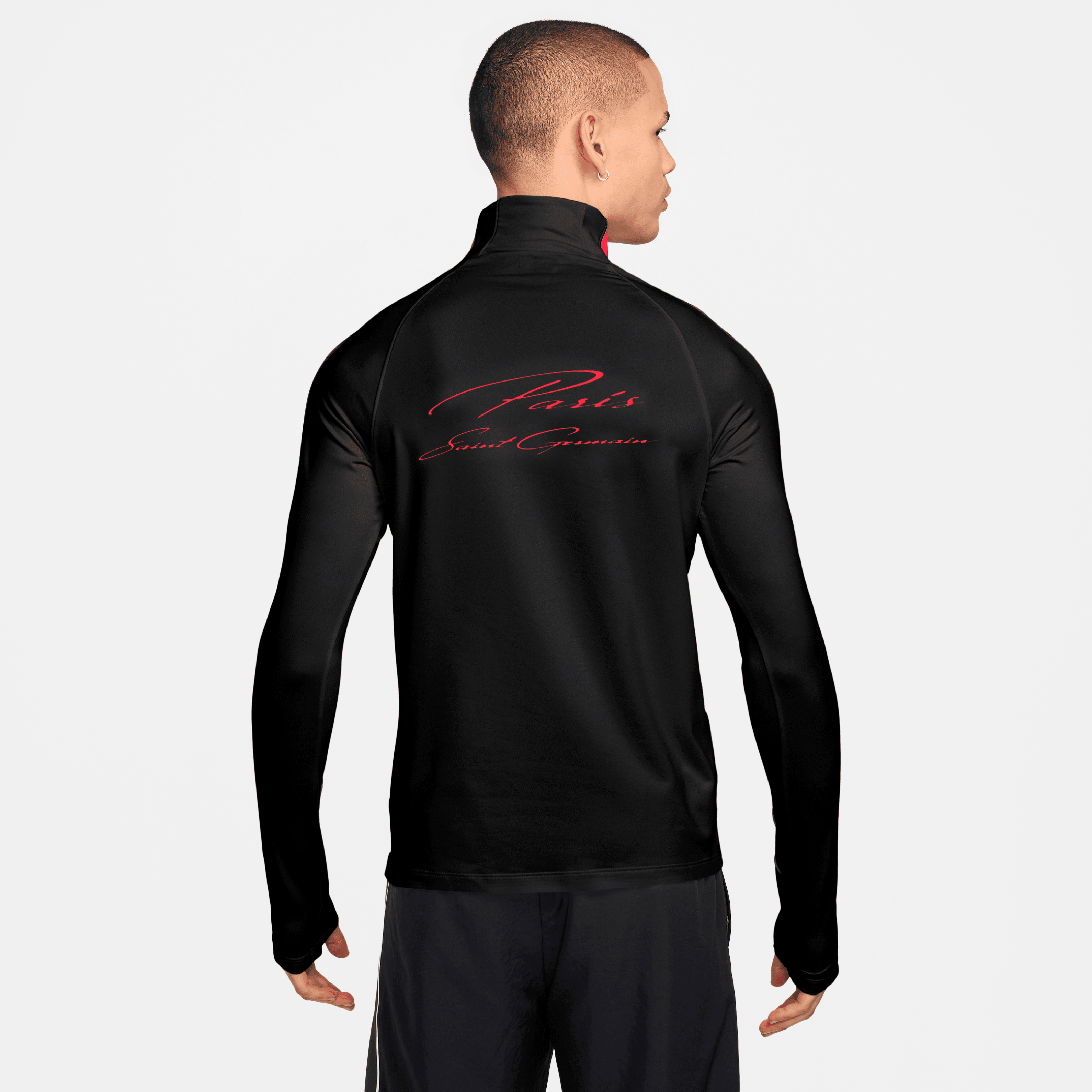 Haut de survêtement Nike Paris Saint-Germain noir pour homme, saison 2026/27, Dri-FIT, manches longues et fermeture éclair au quart.