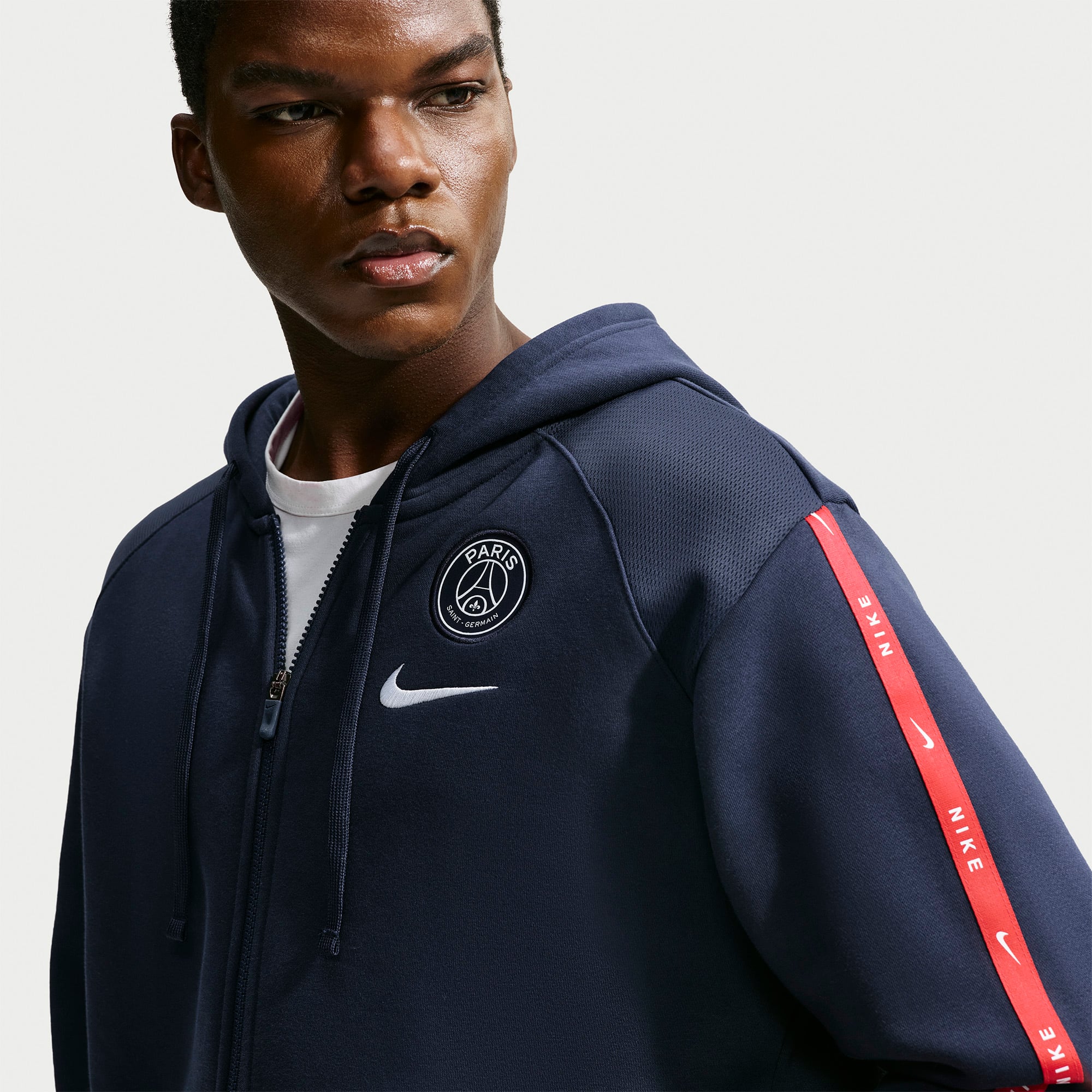 Sweat à capuche zippé raglan Nike Paris Saint-Germain Club bleu marine pour homme