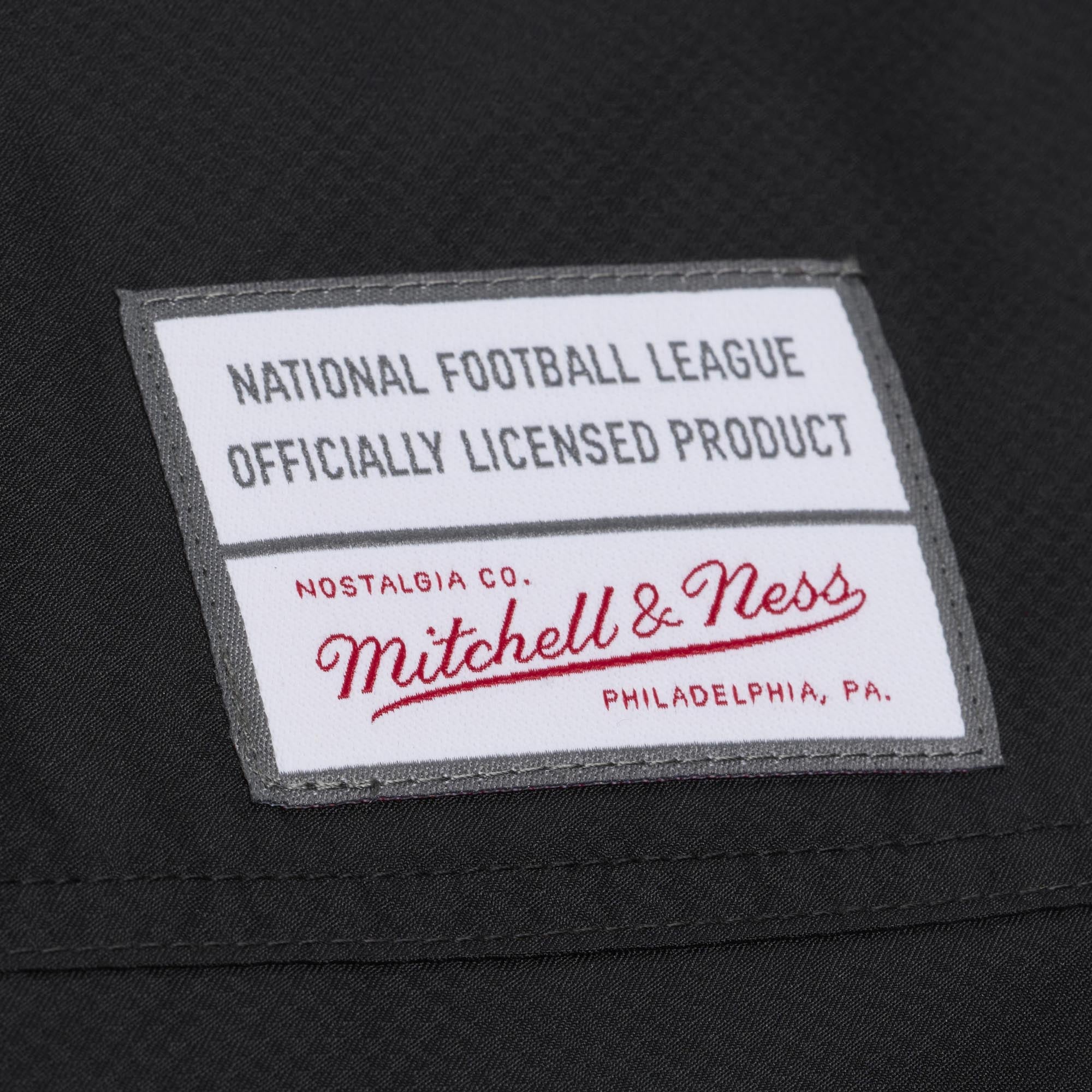 Coupe-vent Mitchell & Ness pour homme, vert nuit/noir, motif à carreaux triples des Eagles de Philadelphie, fermeture éclair au quart.