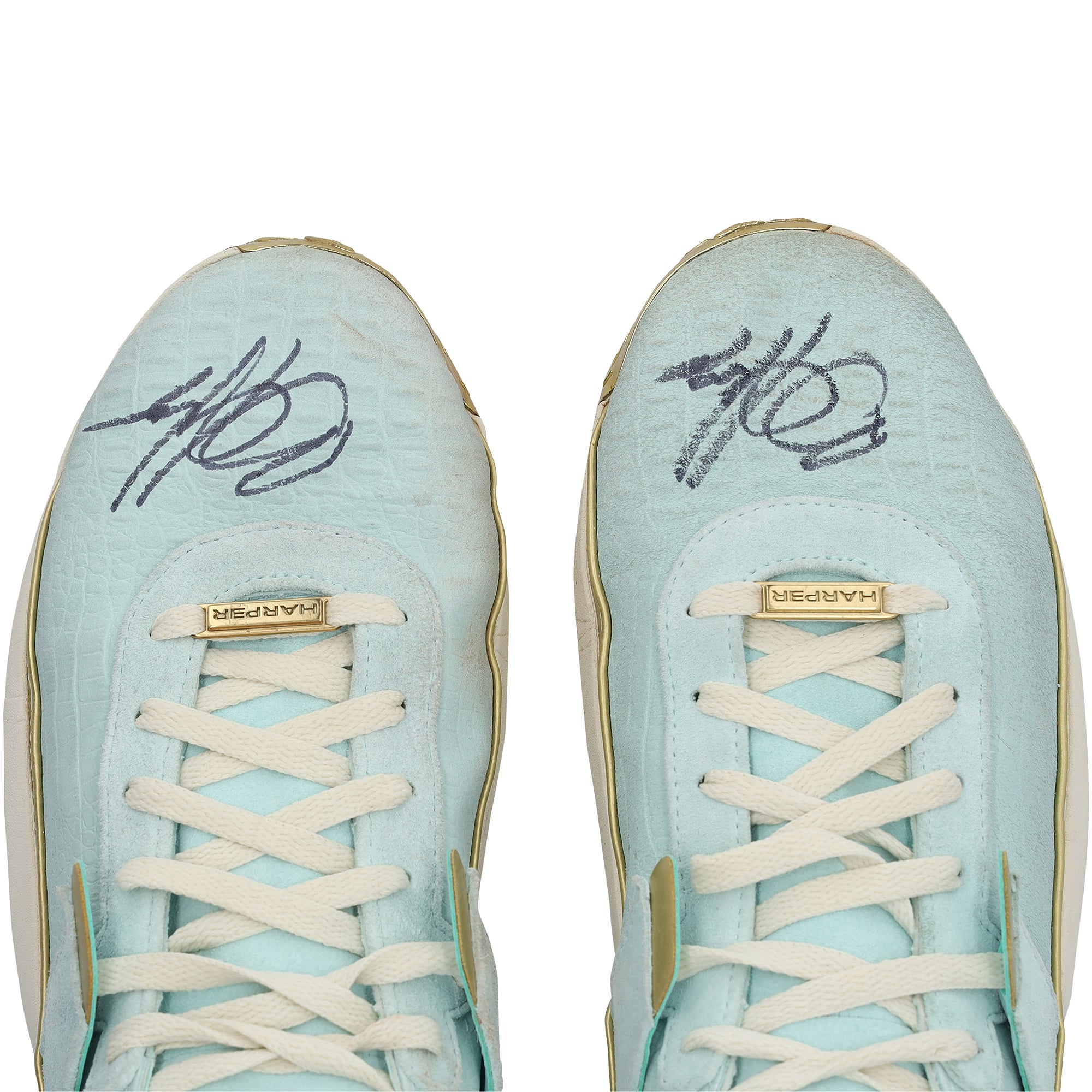 Crampons Under Armour turquoise autographiés par Bryce Harper