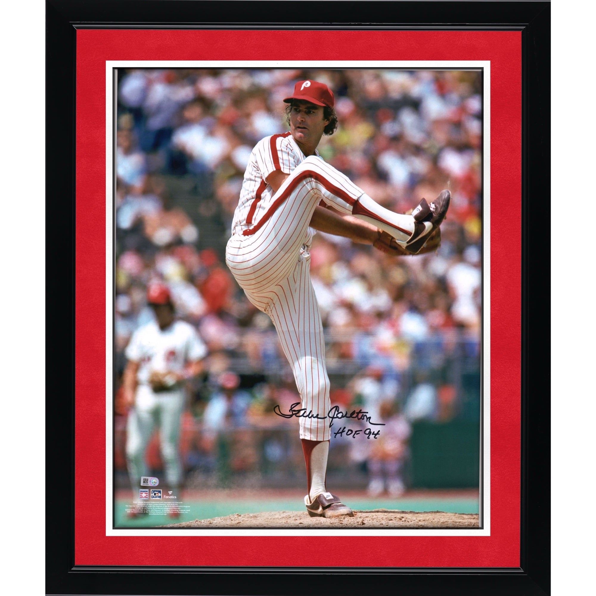 Steve Carlton Philadelphia Phillies Autographed 16" x 20" Pitching Photograph with "HOF 94" Inscription