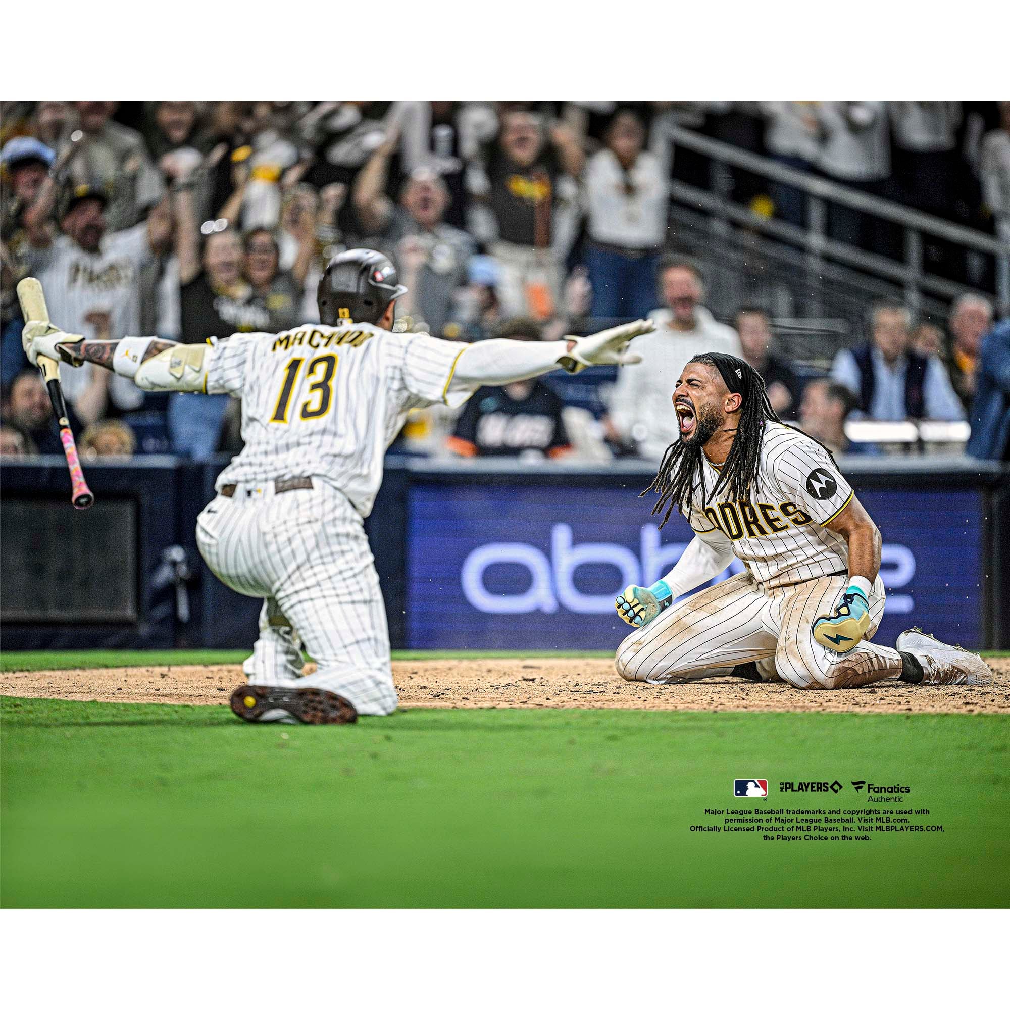Fernando Tatis Jr. San Diego Padres Unsigned 2026 MLB National League Wild Card Series Safe at Home Celebration Photograph