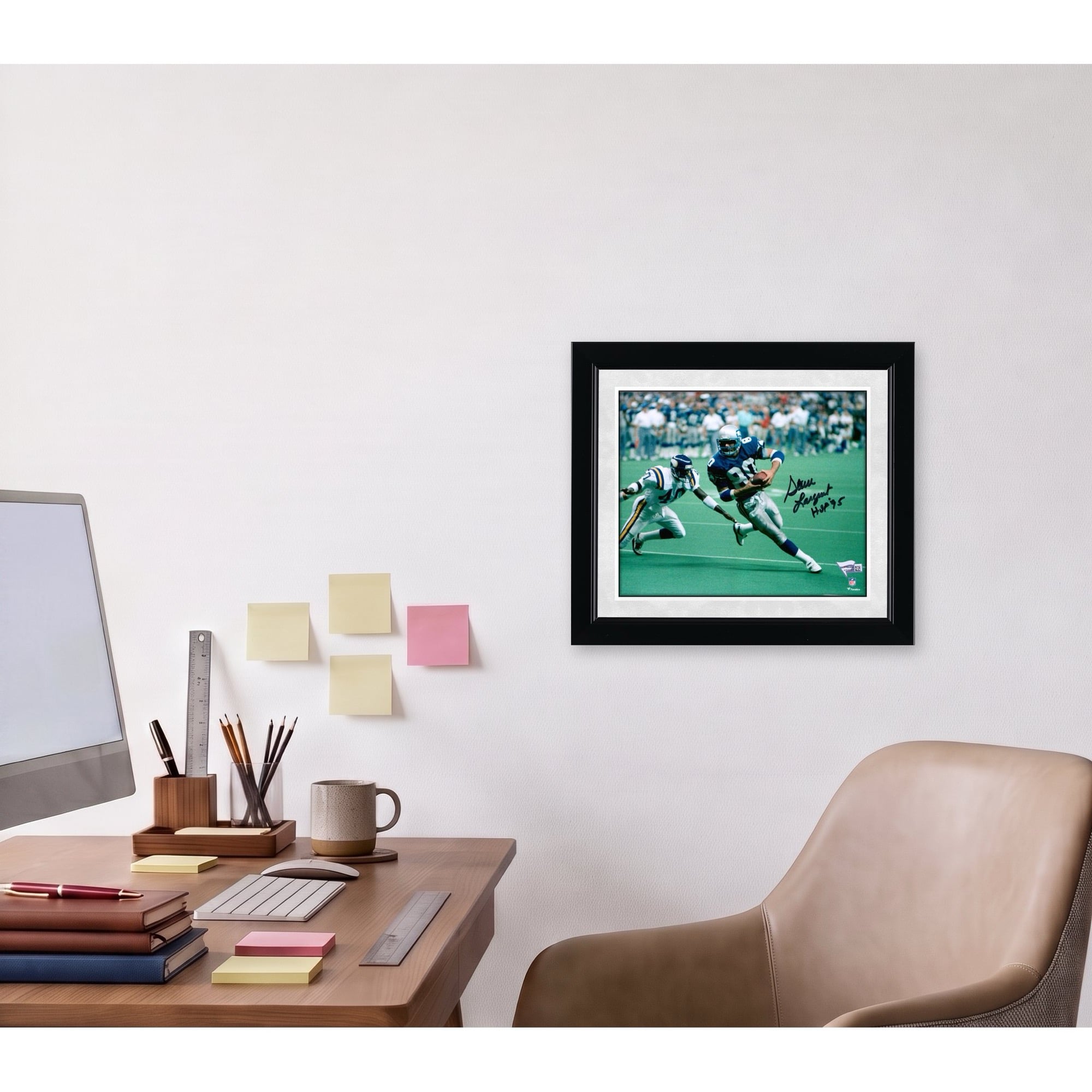 Steve Largent Seattle Seahawks Autographed 8" x 10" vs. Vikings Photograph with "HOF 95" Inscription