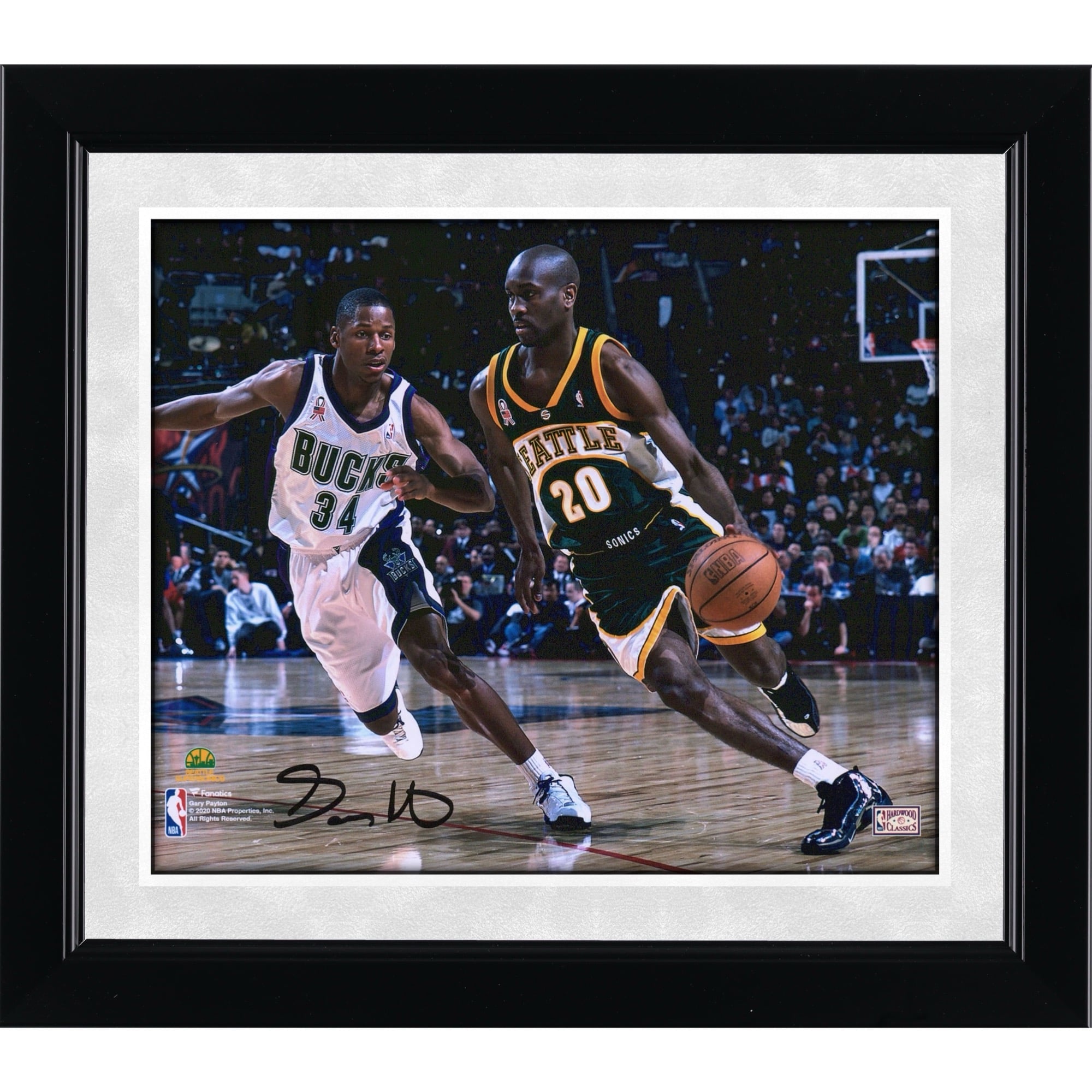 Gary Payton Seattle Supersonics Autographed 8" x 10" Dribbling in Green Photograph