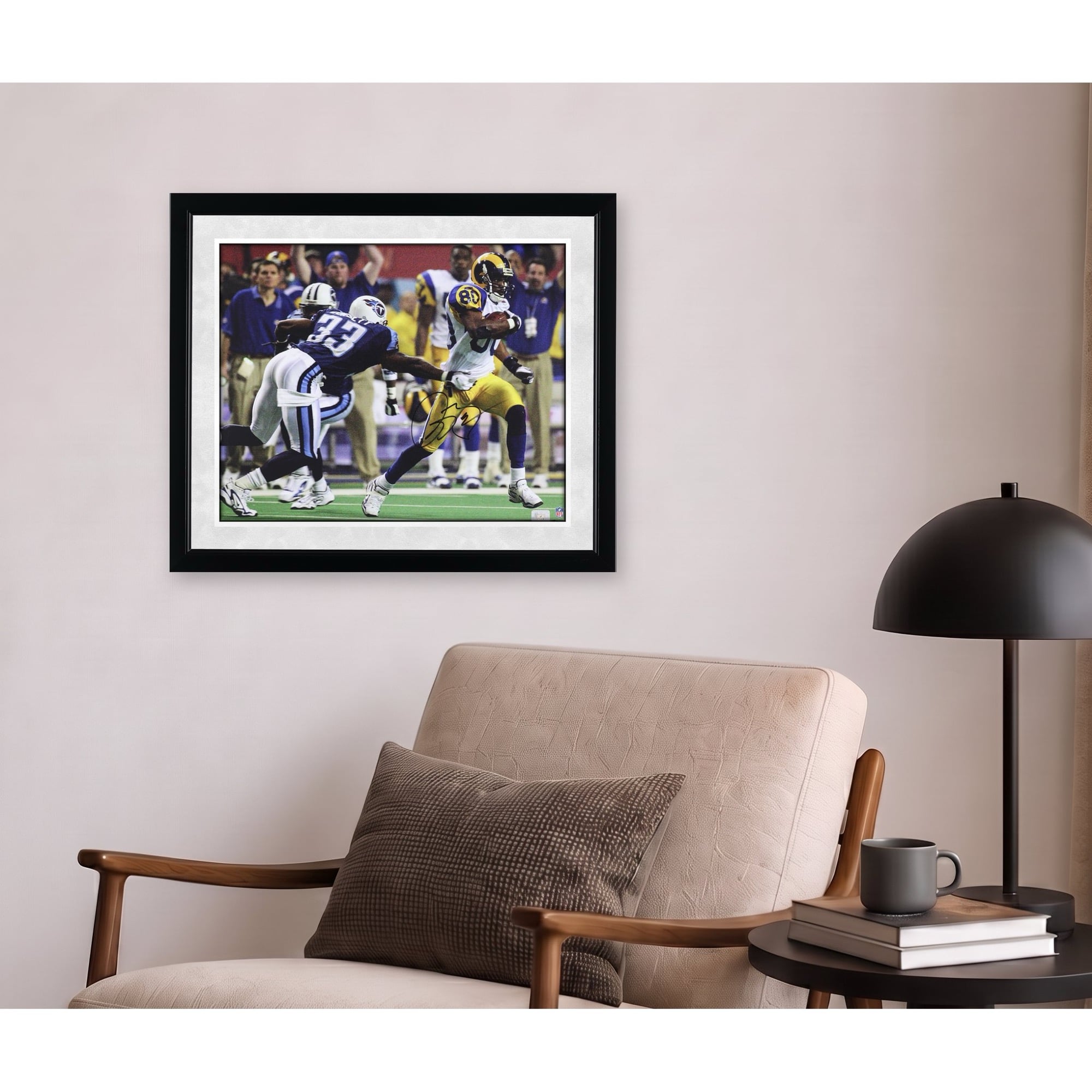 Photo dédicacée par Isaac Bruce, joueur des Rams de Saint-Louis, lors du Super Bowl XXXIV (40,6 x 50,8 cm).