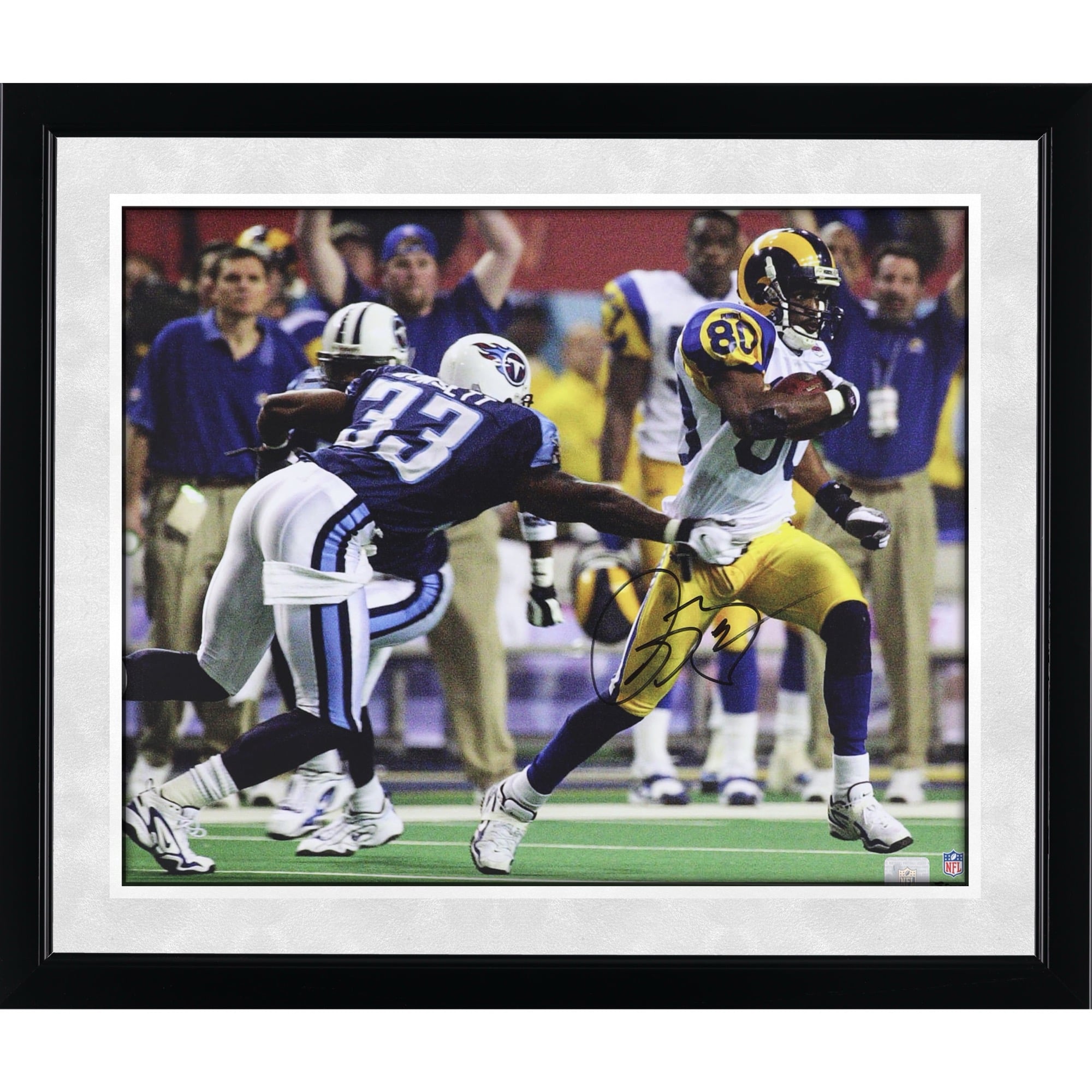 Photo dédicacée par Isaac Bruce, joueur des Rams de Saint-Louis, lors du Super Bowl XXXIV (40,6 x 50,8 cm).