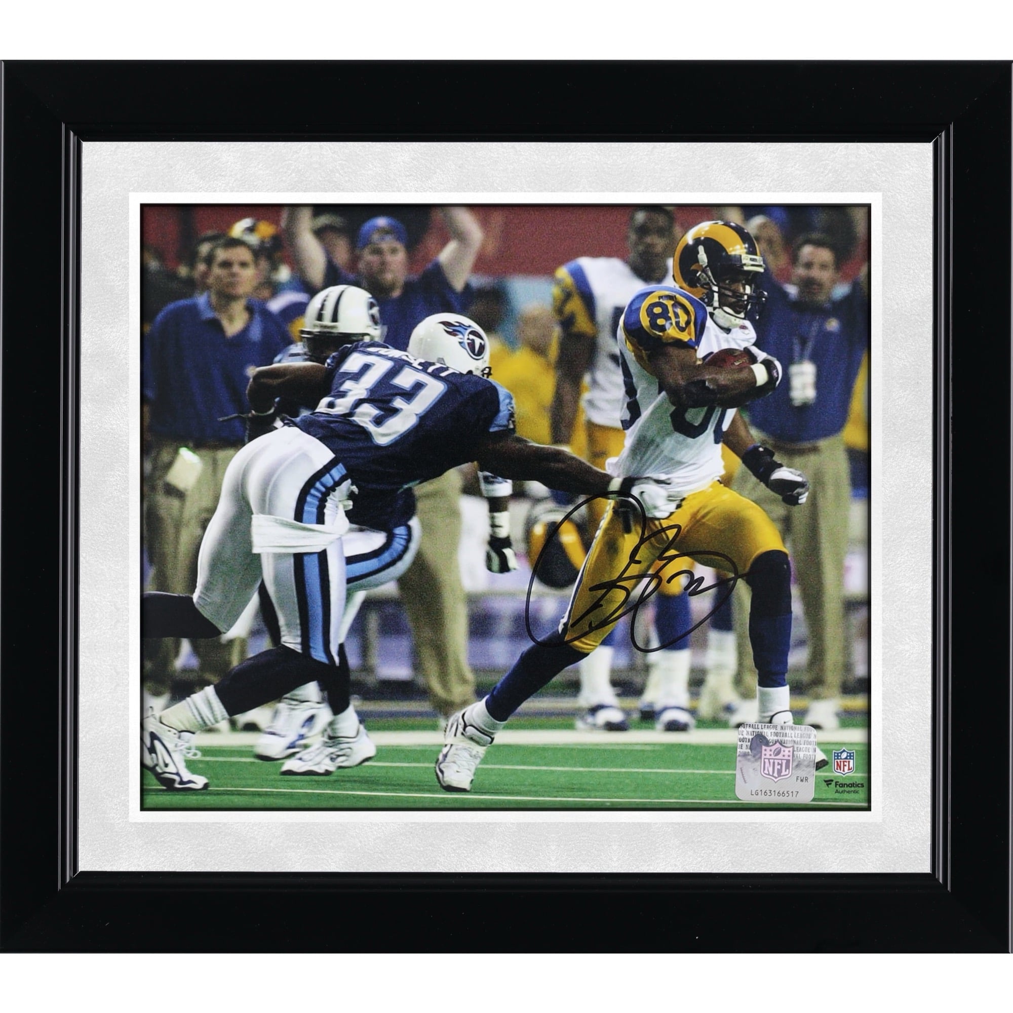 Photo dédicacée d'Isaac Bruce, joueur des Rams de Saint-Louis, lors du Super Bowl XXXIV (8 x 10 pouces).