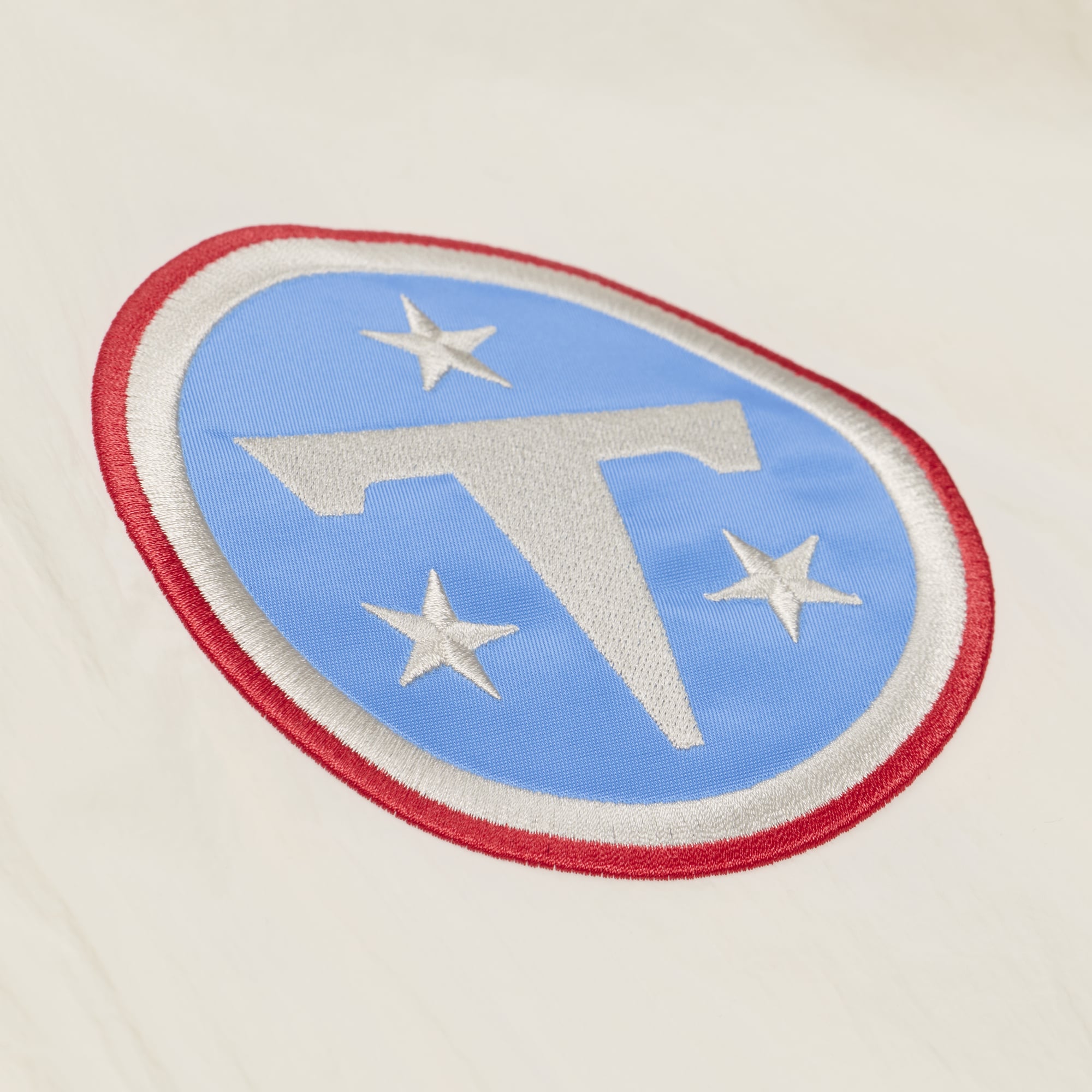 Veste d'entraîneur Mitchell & Ness crème Tennessee Titans Retro Roots pour homme, fermeture à boutons-pression.