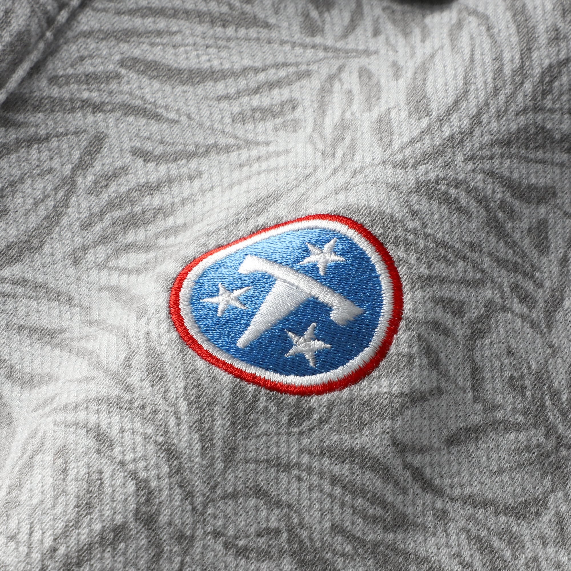 Men's Tommy Bahama Gray Tennessee Titans IslandZone Wild Hibiscus Tri-Blend Polo