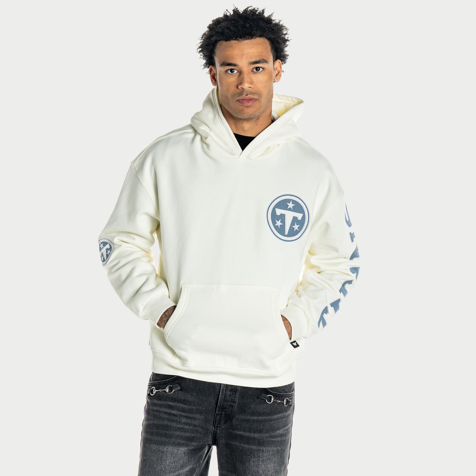 Sweat à capuche oversize unisexe The Wild Collective couleur crème Tennessee Titans