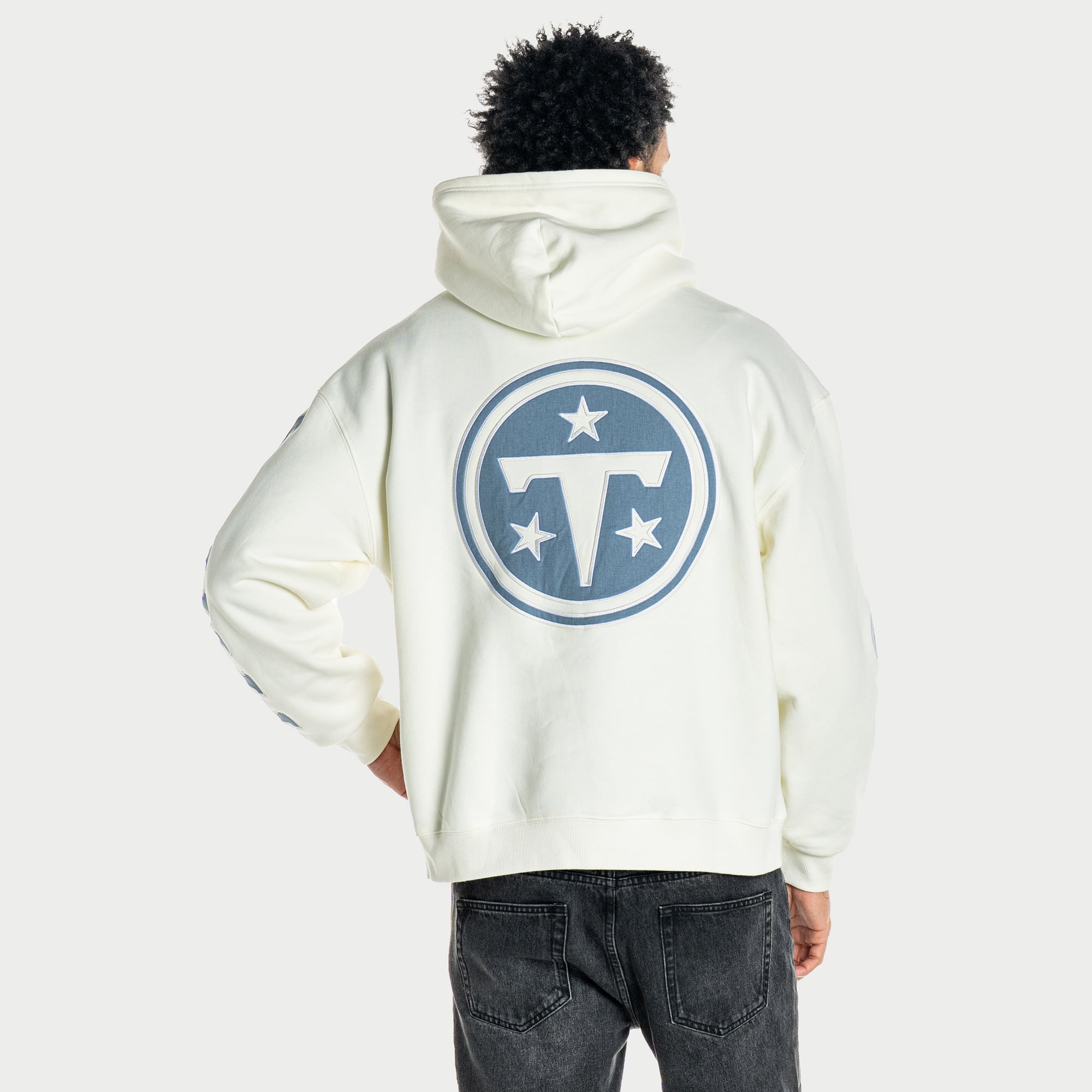 Sweat à capuche oversize unisexe The Wild Collective couleur crème Tennessee Titans