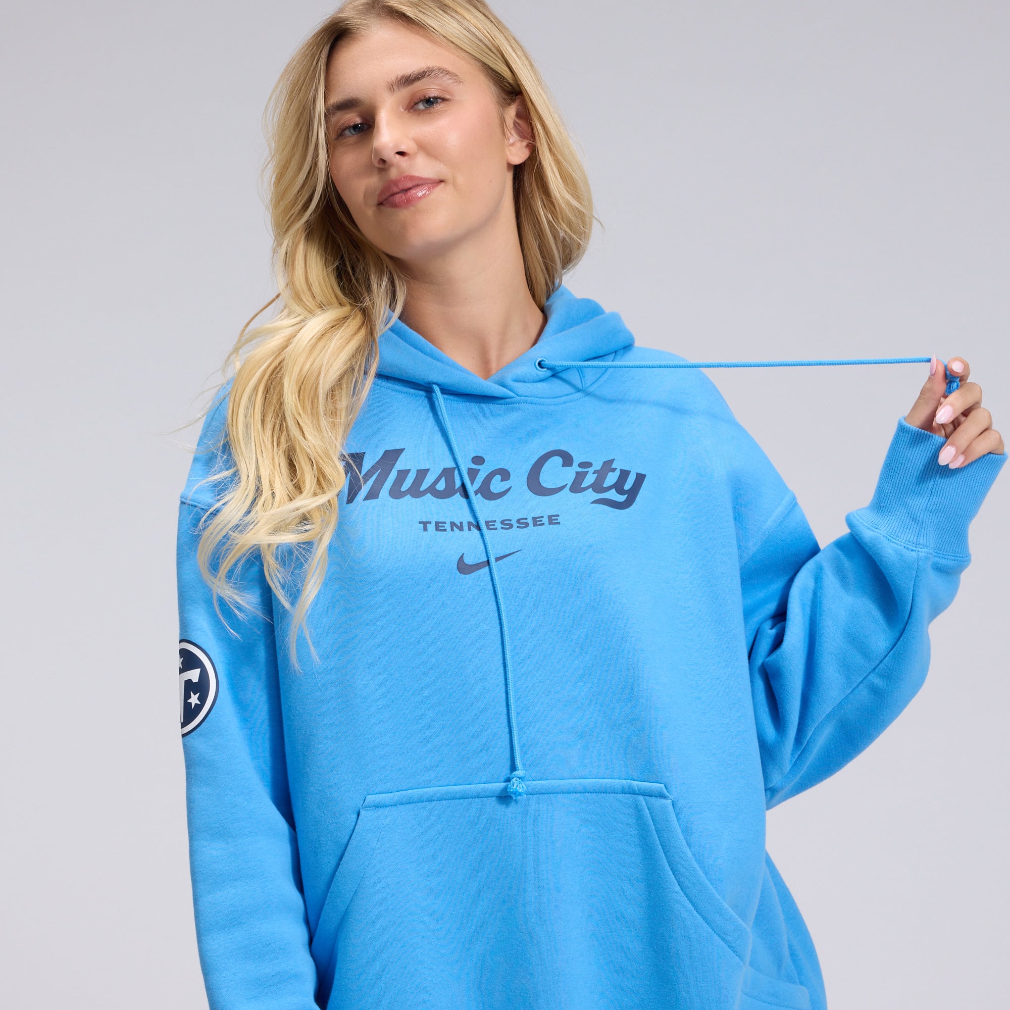 Women's Nike  Light Blue Tennessee Titans 2026 Rivalries Collection Oversized Pullover Hoodie
