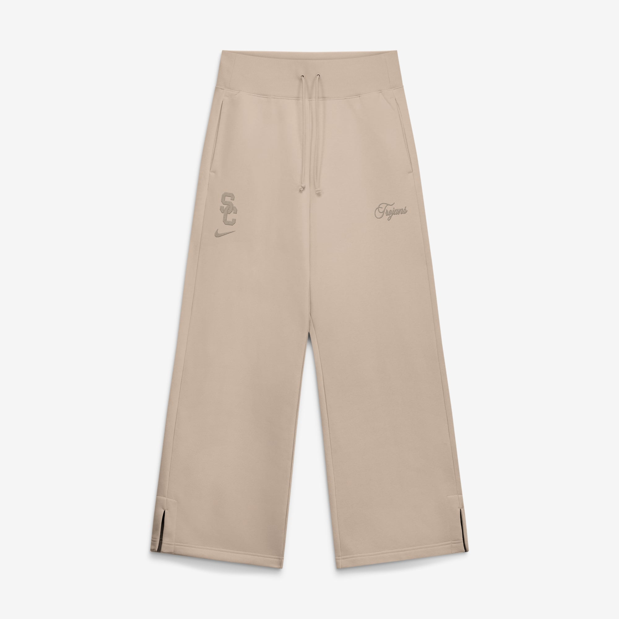 Pantalon de survêtement large en polaire Phoenix la collection Nike USC Trojans Neutral Stance pour femme, couleur beige.