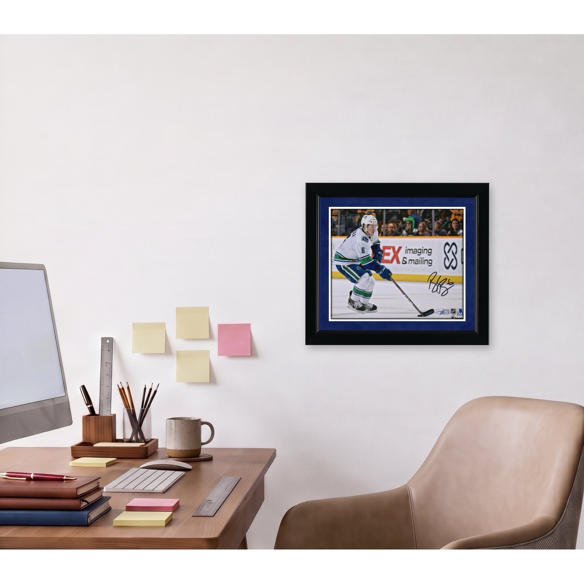 Brock Boeser Vancouver Canucks Autographed 8" x 10" White Jersey Skating with Puck Photograph